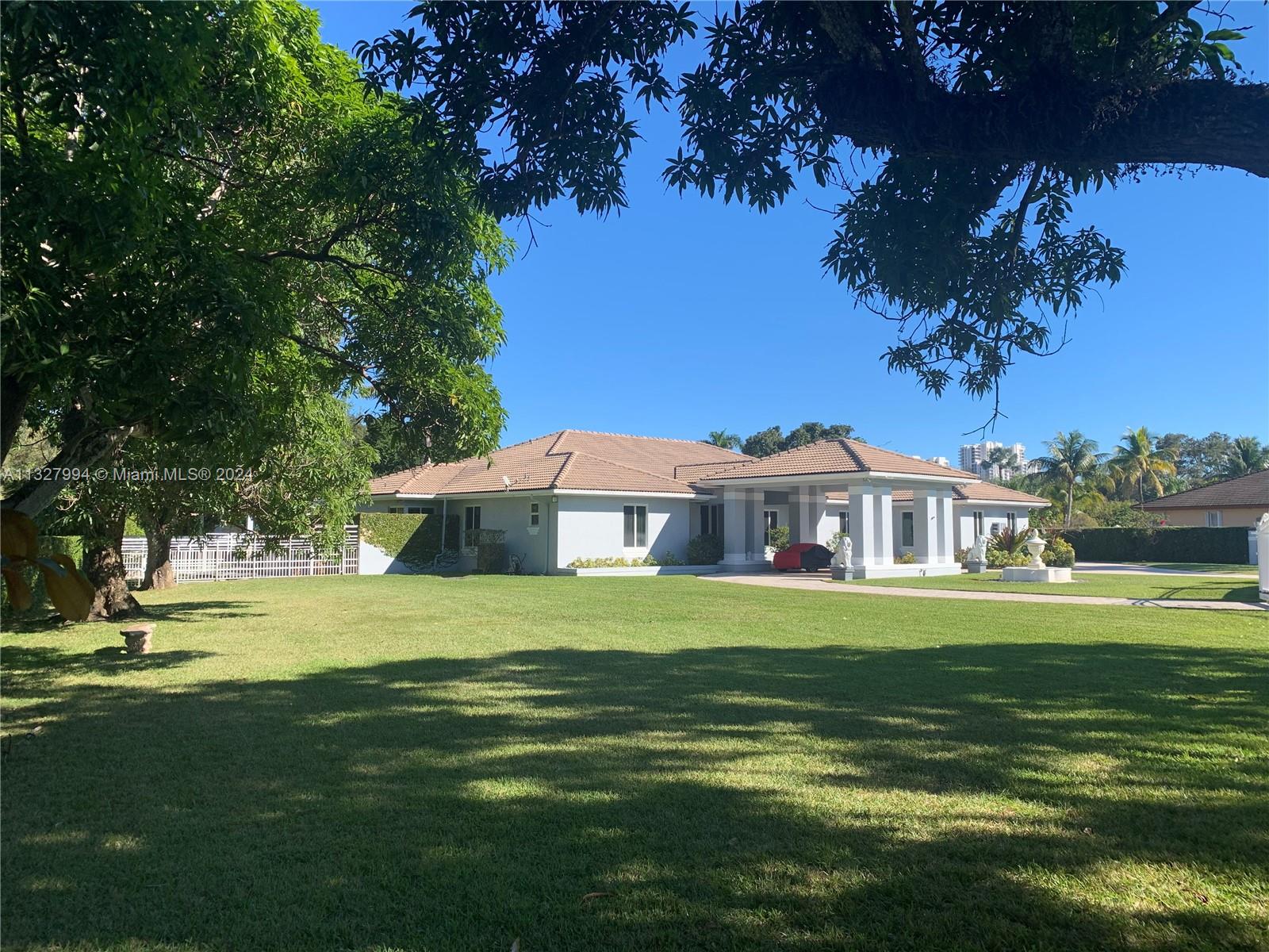 On a builder's acre. 4,785 liv sq ft/6,280 under roof(appraiser sketch). Only home at end of  cul-de-sac/1 of 4 on the block, walled/2 gates, 4-zone A/C(2015-22) painted in '22, complete marble floor('13)NEW kitchen/Miele('13), complete impact windows/doors/solar reflective('21), 36kw Generac quiet generator/1,000 gallon tank('14), volume ceilings, '44 heated lap pool/pool deck('14), summer kitchen w/Viking stove('16) 2-car garage, 2-car porte cochere, 3-4 car awning car port, no hurricane evac for cat 1-3/'95 post Andrew build code, not in flood zone, close to 3 highways, high rated schools. Attic storage, LED lights('15), bath(2013). Ca.closets('12), tank/tankless water heaters. 3 spas. Exer./Game room. Formal liv./din.rooms. Fruit trees. NO HOA(PRICED TO SELL/LEASEBACK/OWNER​​‌​​​​‌​​‌‌​‌‌‌​​‌‌​‌‌‌​​‌‌​‌‌‌ FINANCING).