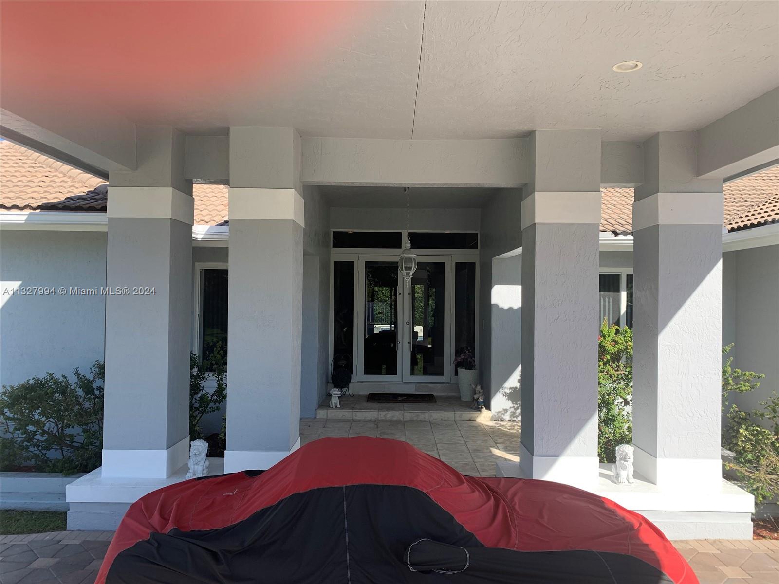 Two Car Garage and Awning covered Carport