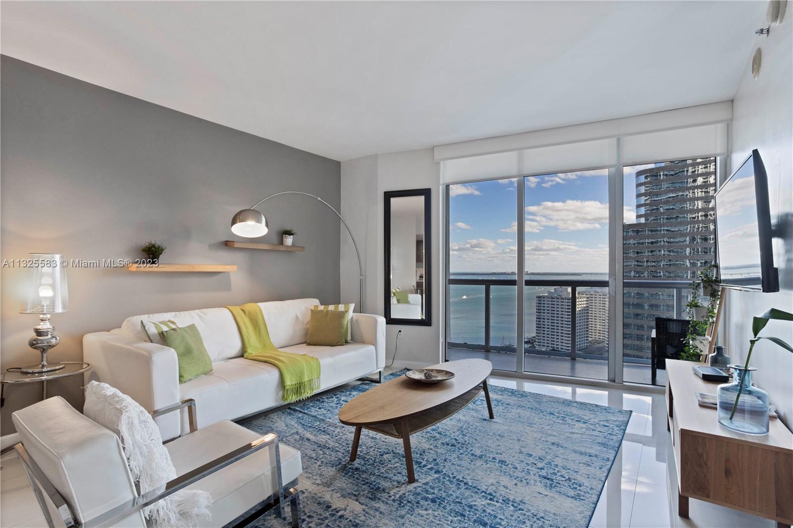 AMAZING INVESTMENT OPPORTUNITY. Best price in BUILDING. Luxury 2-bedroom (legally 1+DEN) with fantastic views of Biscayne Bay and the Brickell Skyline. Turnkey furnished and fully equipped for short-term rentals and Airbnb.  The building is located in one of the hottest areas of Miami. Walking distance of Brickell City Center, restaurants, bars, banks, and parks. Low maintenance. Icon Brickell (the W Hotel Tower) offers amenities including an exercise room, billiard room, business center, theater, heated lap pool, spa, community room, child play area, 24-hour security, valet parking, and more!