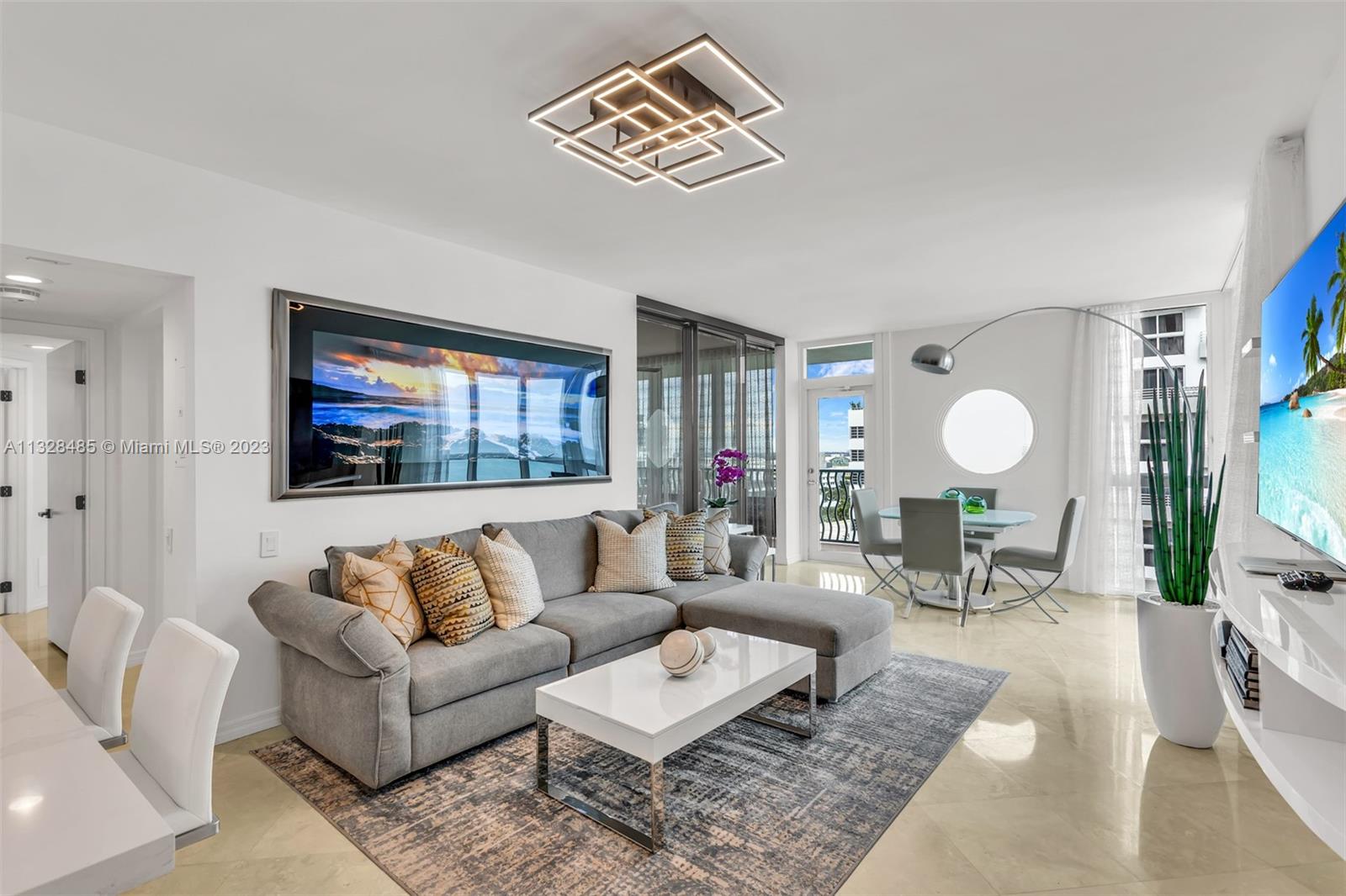 HAPPINESS IS WAKING UP TO VIEWS OF THE OCEAN. Corner residence at the award-winner Michael Graves Oceanfront Luxury Condo, amazing direct ocean and bay/city views. Beautifully remodeled by award winner NMR DESIGN GROUP, new bathrooms and kitchen, marble floors throughout, top-of-the-line appliances including Sub Zero, new kitchen cabinetry, custom closets, lighting and custom white window treatments. Mother of Pearl pool, new steam bath & sauna, gym, Peloton Bike and private beach area exclusively for its residents with water & towel service. Other amenities include a barbecue area, social room, 1500 branded communal bikes and a full professional & friendly staff to serve you! ON THE OCEAN WITH CHARM AND WARMTH BEYOND BELIEF! MAKE EACH DAY A BEACH DAY A LA MICHAEL GRAVES STYLE!