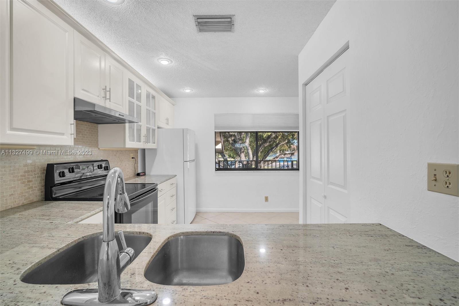 Granite countertop, open to Great Room