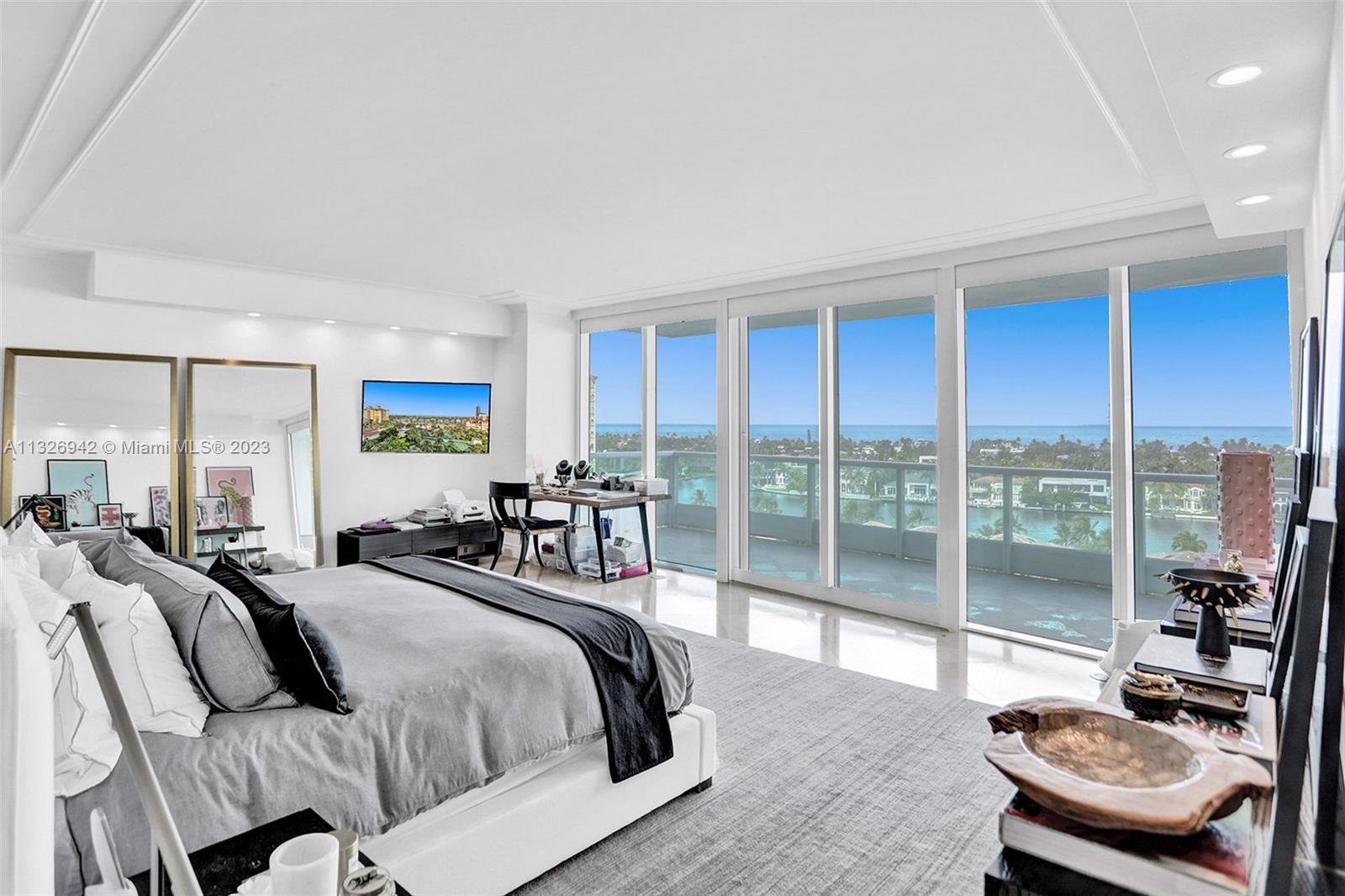 Beautifully updated 4 Bed, 5 Bath flow-thru unit at Porto Vita South Tower. Walk in through your private foyer entrance to an open, modernized living space with marble floor throughout. The master suite and living area face east, with separate private terraces with Intracoastal and ocean views. The other 3 ensuite beds face west sharing a large terrace with water, a golf course, and city views. The clubhouse went through a multi-million dollar renovation. Whether you choose to dine poolside or in one of the other 2 restaurants, you will feel the luxury of resort-style living. The spa offers daily classes, one-on-one training, pampering massages, and facials, as well as an onsite full-service hair salon. Enjoy tennis courts indoor/outdoor bars, boat slips, and more. Live the Porto Vita Life