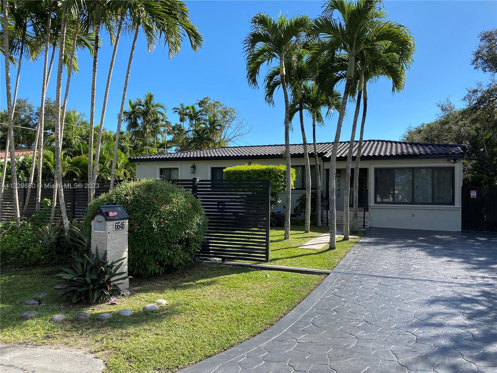 South Miami. Corner. Natural Light throughout home. Open concept layout. 3 bdrm 2 bath. lot size 11,264. Impact windows and doors, 2020. Aluminum fence w remote gate, 2021. Barrel tile roof. 2023 central ac (waiting for permit). Freshly painted indoors and driveway. Refinished wood floors, 2023. Extra office space/ inlaws/ family room separate entrance. Sprinkler well water.   All permitted with South Miami. Septic tank cleaned 2020. Fruit trees & Oak tree. Separate gates within property to store toy vehicles. Possibilities for pool. Top rated schools across street all walking distance (a parents' dream). Palmer's park feet away. Girl Scouts South Miami Little house across the street. 5 minutes from UM, entertainment, dining, medical services, and public transportation. Owner Broker.