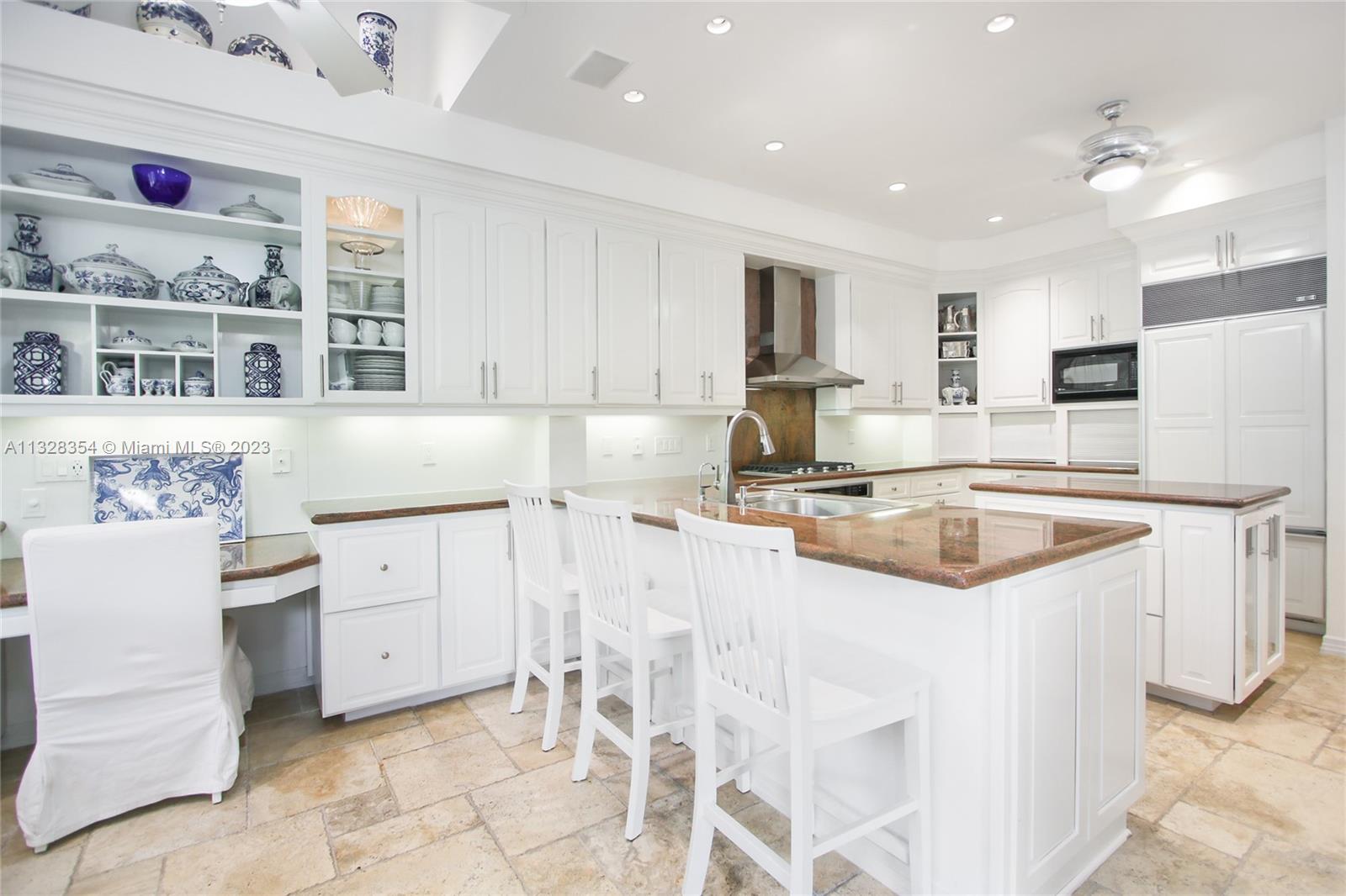 Great dining area in the kitchen as well as center island seating and study desk. Perfect for having your kids do their homework while you make dinner - or your guest have a glass of wine while they watch you cook!