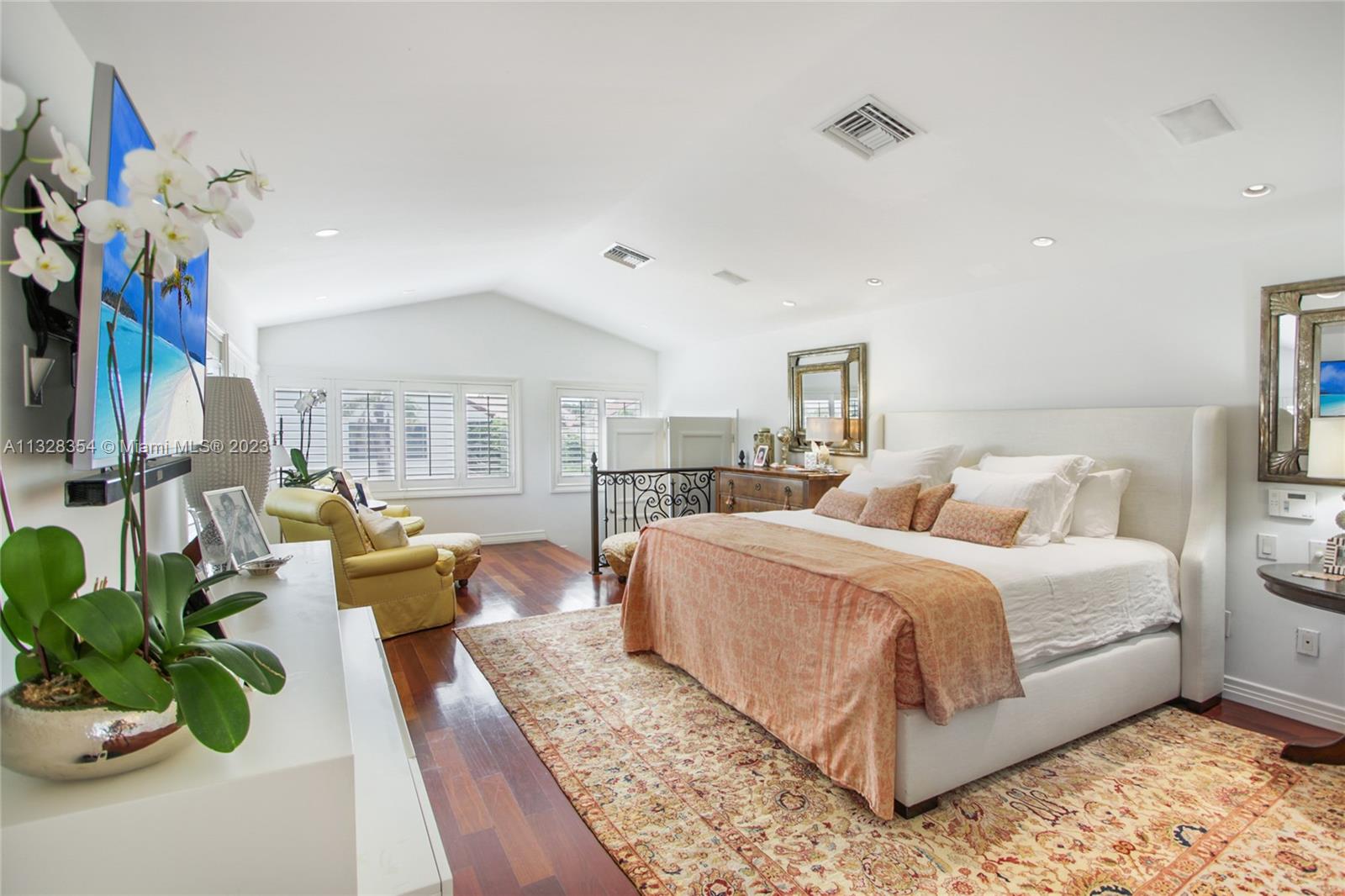 Oversized 1,100 sq. ft. primary suite has a sitting area as well as well-appointed home office.
