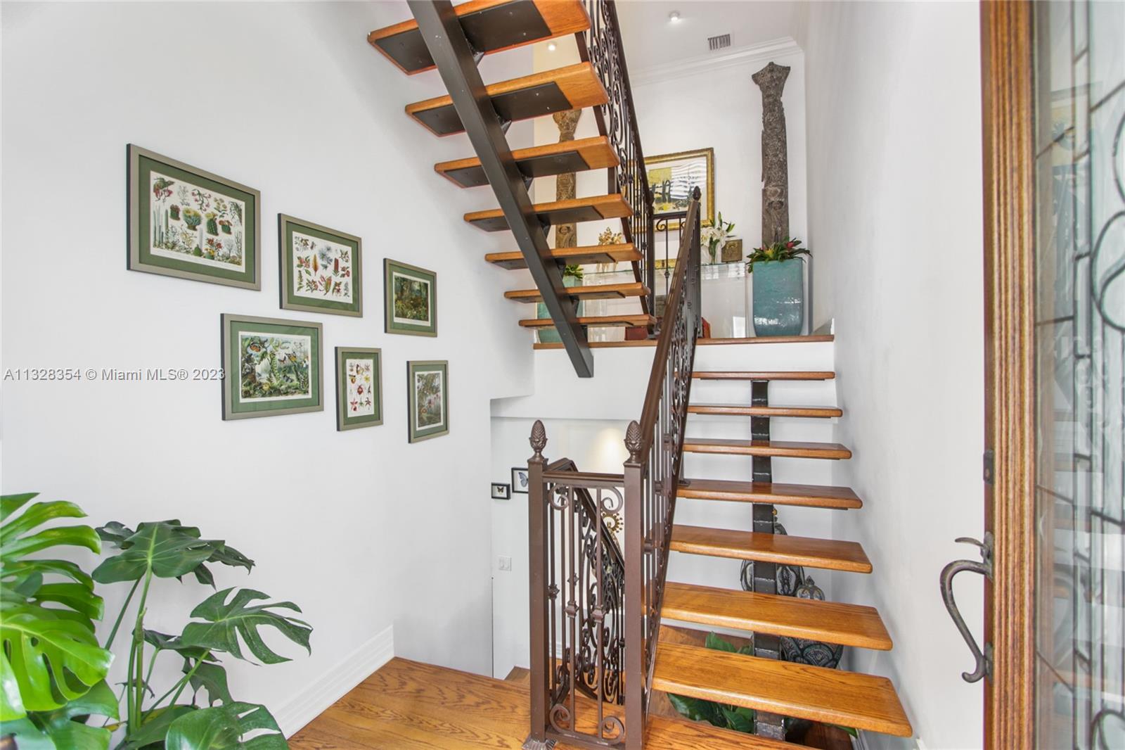CASA SERENA's main entry landing and staircase as you enter the front door.