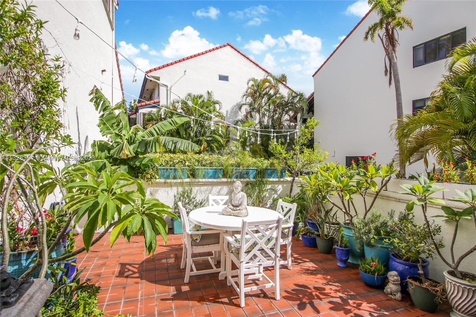 Beautiful garden level patio is a wonderful place to relax or indulge in your gardening hobby