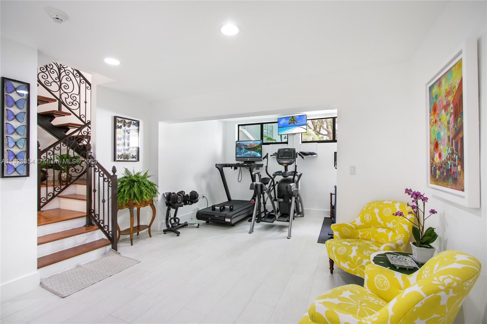Lower floor gym area, can be converted to bedroom or den