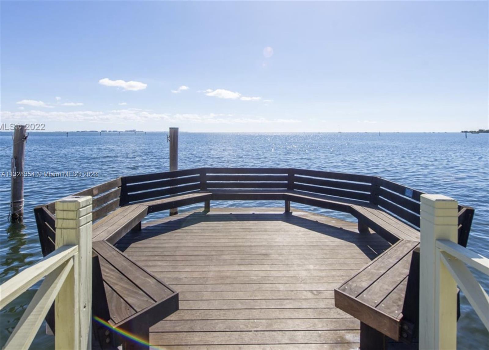L'Hermitage is an 11.5-acre waterfront community directly on Biscayne Bay. Neighbors meet here in the evening to have a glass of wine and catch up.