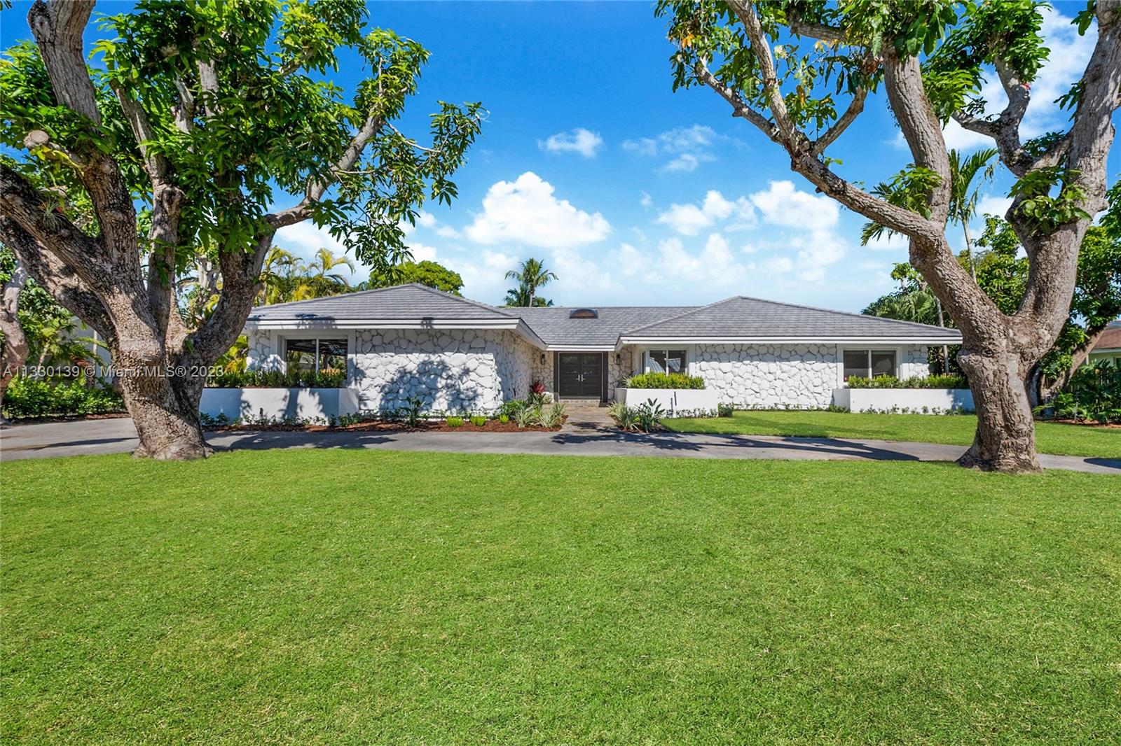 Need the A rated Southwood school district? Want a home office? Enjoy bright spaces, vaulted ceilings & a working fireplace? This is the home for you! Brand new roof, impact windows and doors, modern spacious pool deck with built in grilling station & brand new pool with a submerged lounging bench, this beauty speaks for itself! An enormous rear primary bedroom with equally enormous spa-like bath opens to the tropical pool deck and to a hall with 3 spacious bedrooms w/ roomy closets. Oversized kitchen with dinning nook overlooks pool and opens to a spacious home office. Lawn and maintenance included. Paradise awaits!