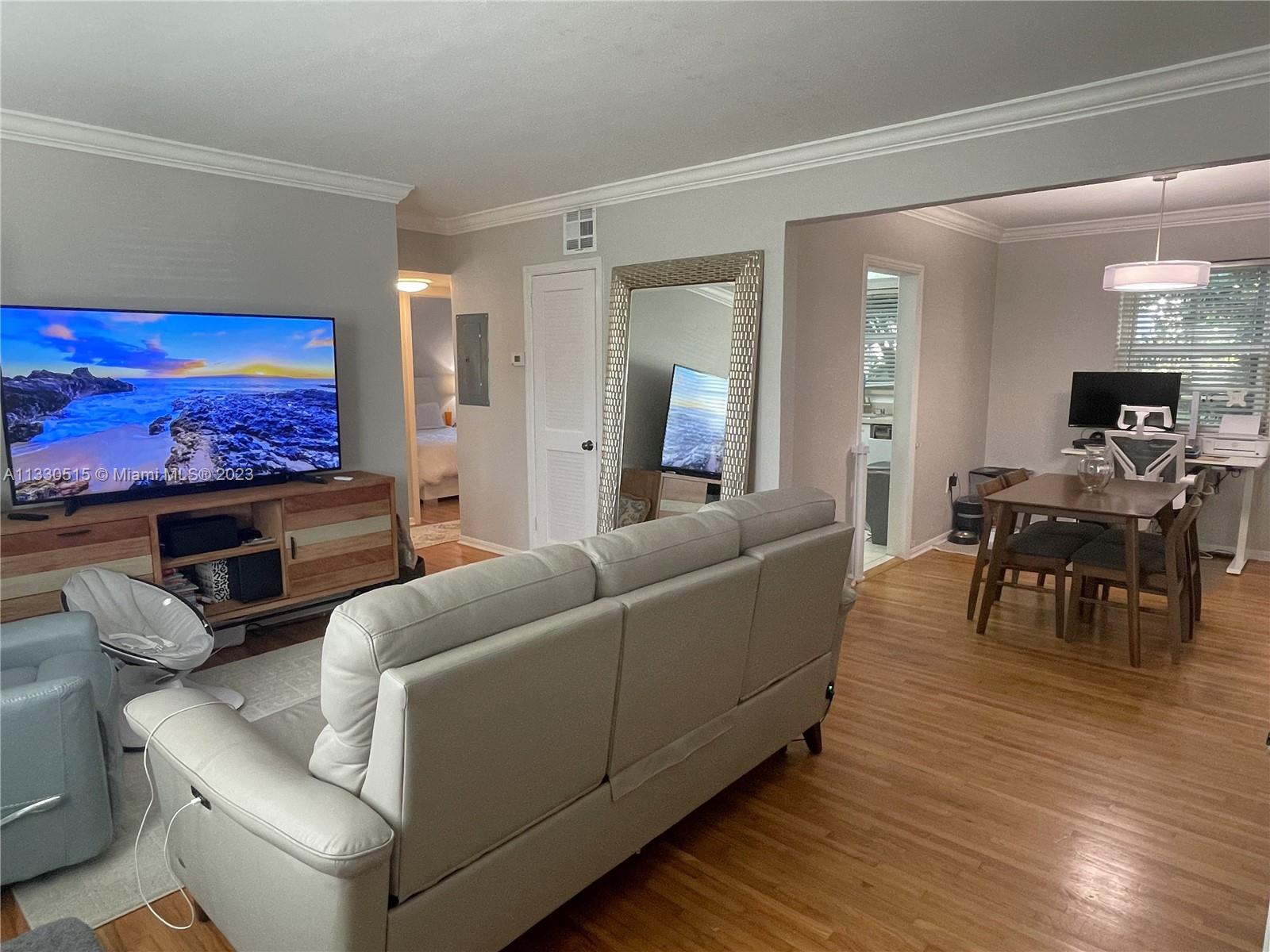 Lush tropical hidden gem community of Pathways. Rarely available 2/1 unit on first floor which leads out to lovely gardens. Lifestyle of a townhouse. Brand new impact windows, New AC, AC vents, and electric panel installed in 2021. Well kept original Dade Pine wood floors throughout. Community pool nestled within beautiful vegetation. 1 decal un-assigned parking space and additional guest vehicle parking available. Community will soon be freshly painting the exterior of buildings. Close to the University of Miami, and walking distance to local restaurants, entertaining, and Sunset Place mall. Located within Sunset Elementary School zone.
