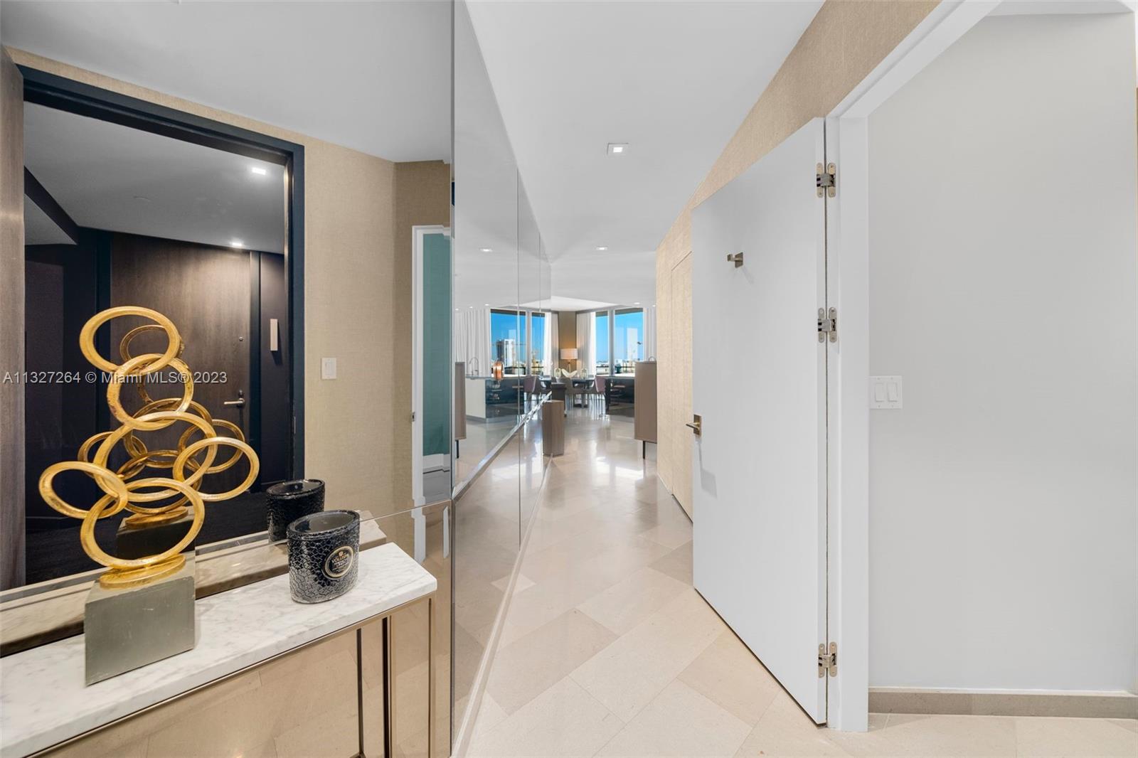 A beautifully designed, turnkey furnished 3-Bedroom, 3.5 Bath condo at Rise at Brickell City Centre with 1,645 interior square feet; marble flooring throughout; full-size washer & dryer; custom built-in closets in all bedrooms; 9-foot-4-inch high floor-to-ceiling glass windows; and a large, wrap-around balcony with sweeping views of the city skyline and Miami River. Includes all furnishings, electronics, artwork, dishware, linens, and one assigned parking space. Building amenities include a heated pool, hot tub, fitness center, children's playroom, full-service spa, business center, party room, 24-hour valet parking service, and 24-hour concierge service. Rise at Brickell City Centre is in the heart of Brickell with an array of luxury shops, restaurants, and entertainment at your doorstep.