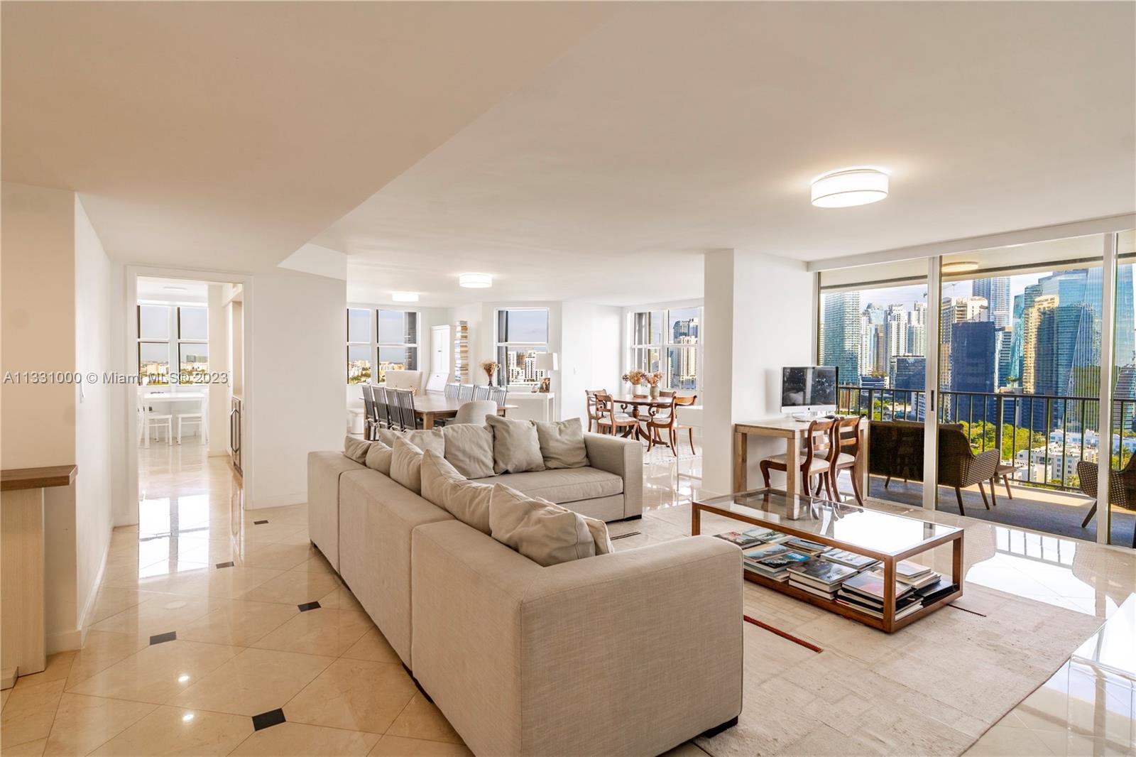 Stunning oversized 4 bedroom home in the sky, with panoramic views of the Biscayne Bay and Brickell skyline. This spacious and fully renovated apartment, located in the most prestigious area of Brickell, is a rare finding in Brickell, due to its unique floor-plan, generous living areas and incredible amenities within the famous Brickell Place condominium. Tastefully finished and upgraded, this home in the sky is move in ready and is ideal for large families, who love to entertain without compromising their privacy within the almost 3,200 square feet of interior living space. Brickell Place condominium offers a very private and secure environment, integrated with great amenities such as, swimming pool, tennis and racket ball courts, marina and much more. Unique Opportunity that wont last!
