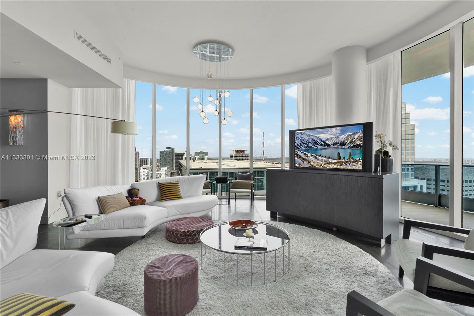 No detail has been spared in the decoration of this beautiful corner unit, the best line of the building.
Decorated by renowned Interior Designer Alex Batista. With all glass walls around this corner unit, majestic water views, with breathtaking sunrises. Kitchen is fully equipped w Miele appliances, Large master suite offers 2 master closets, with a built-in safe. Full surround sound system & electric window treatments in every room, laundry room.  The Epic has hotel like amenities, w 2 rooftop heated pools, state-of-the-art Fitness Spa, meeting and children rooms, 24 hours security & concierge. 
Famous Restaurant Zuma fine dinning and Area 41. Unit is sold "AS IS" and completely furnished.