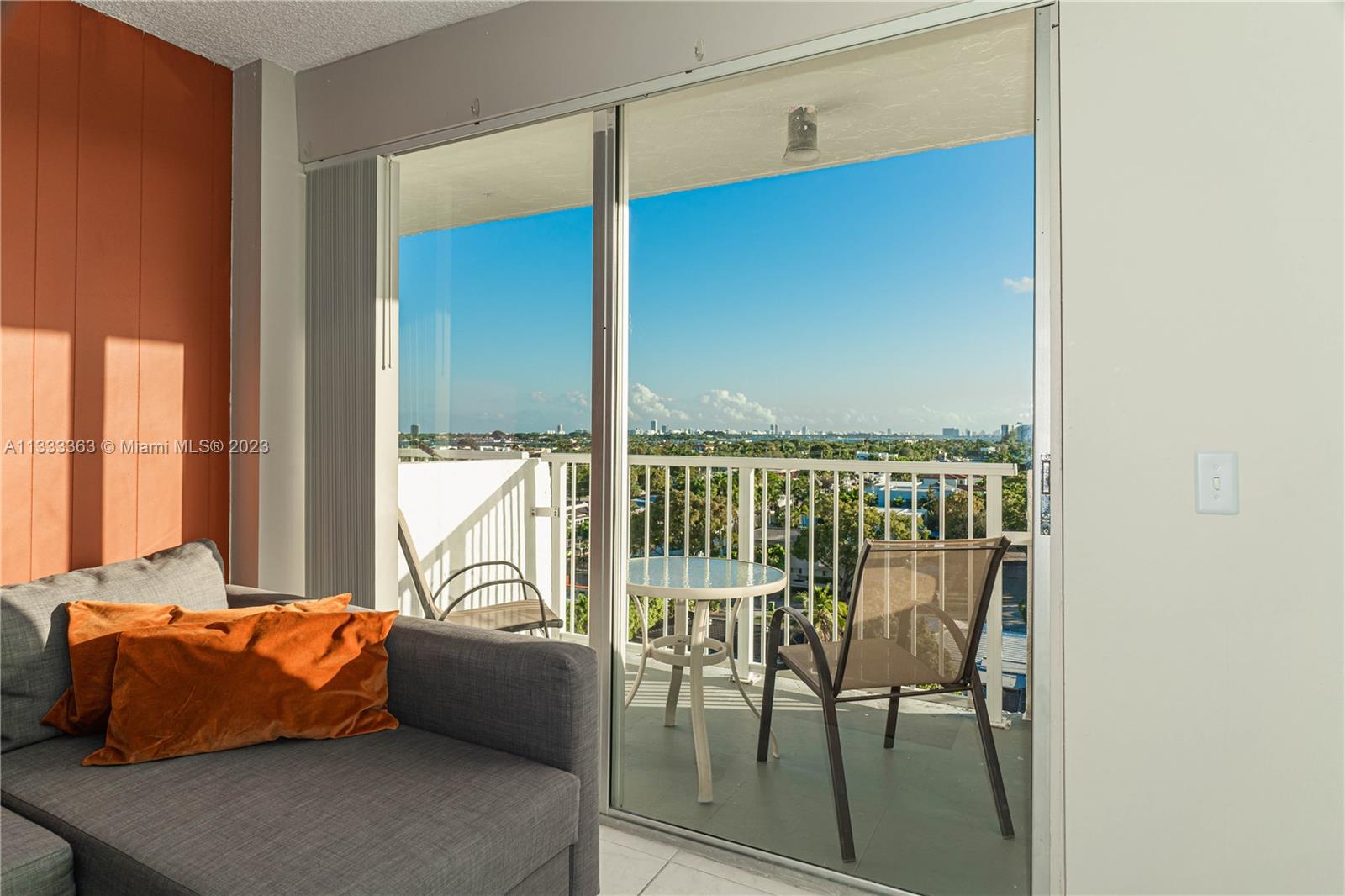 View from inside unit, bedroom and balcony.