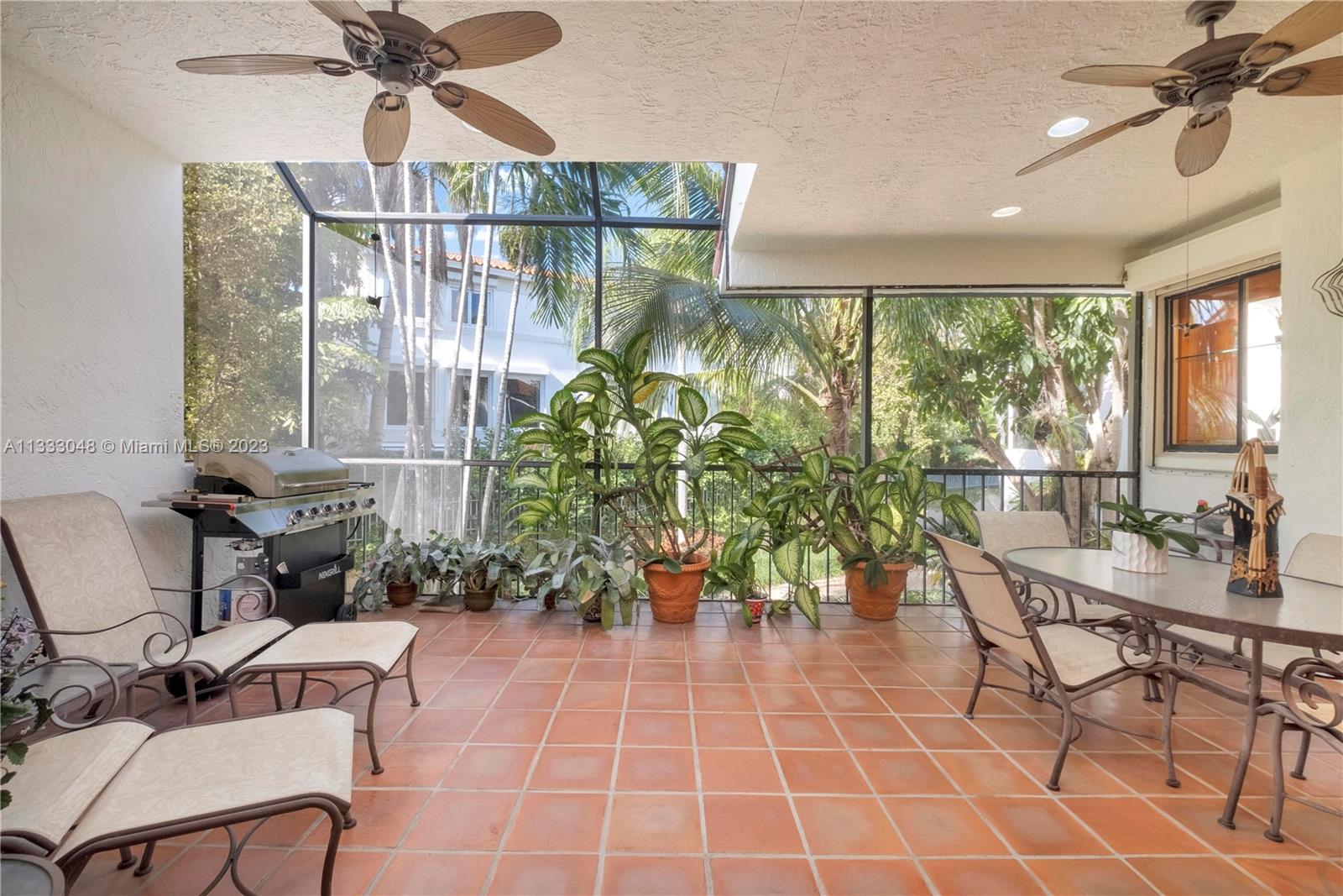 Screened patio off dining area