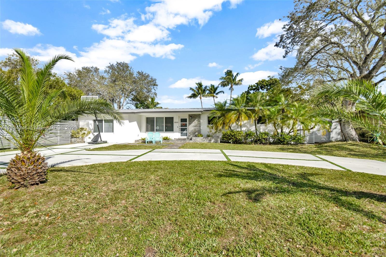 THIS SOUTH MIAMI HOME SITUATED ON A DEATH END ROAD   OFFERS AN UPDATED KITCHEN, BATHROOMS AND POOL. THIS 4 BEDROOM & 2 BATH HAS A SPACIOUS OPEN FAMILY ROOM. LARGE IMPACT WINDOWS AND 2 SETS OF FRENCH DOORS MAKE THIS ROOM LIGHT AND BRIGHT.  TILE FLOORS, RECESSED LIGHTING. 
CORNER LOT IS OVER 11,000 SQUARE FEET. 
LARGE SALINATED POOL & PATIO OFFER LOTS OF FUN IN THE SUN.
GREAT FAMILY HOME/SUPER LOCATION.