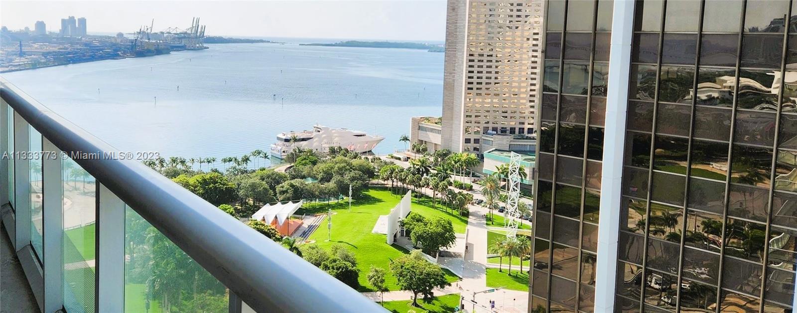 Perfect opportunity to live in one of Downtown Miami’s most iconic buildings. This 2/2 Corner unit with huge wraparound balcony and split floorplan. Beautiful bay and city views. Tastefully furnished and in move in ready condition. Cable, Internet and water all included in HOA. 1 assigned parking space. This spectacular condo has amazing first-class amenities that include: Olympic-size heated pool, state-of-the-art spa, fitness center, security, valet parking and more .AMAZING LOCATION!!! Right across from Bayfront Park. Easily walk to 5 star restaurants, Whole Foods, Silverspot Cinema and much more.  20 minutes to Miami Intl Airport, South Beach, I-95, Coral Gables. Great public transport accessibility - free services on Metromover and  Miami Trolley, Metrorail and Brightline.