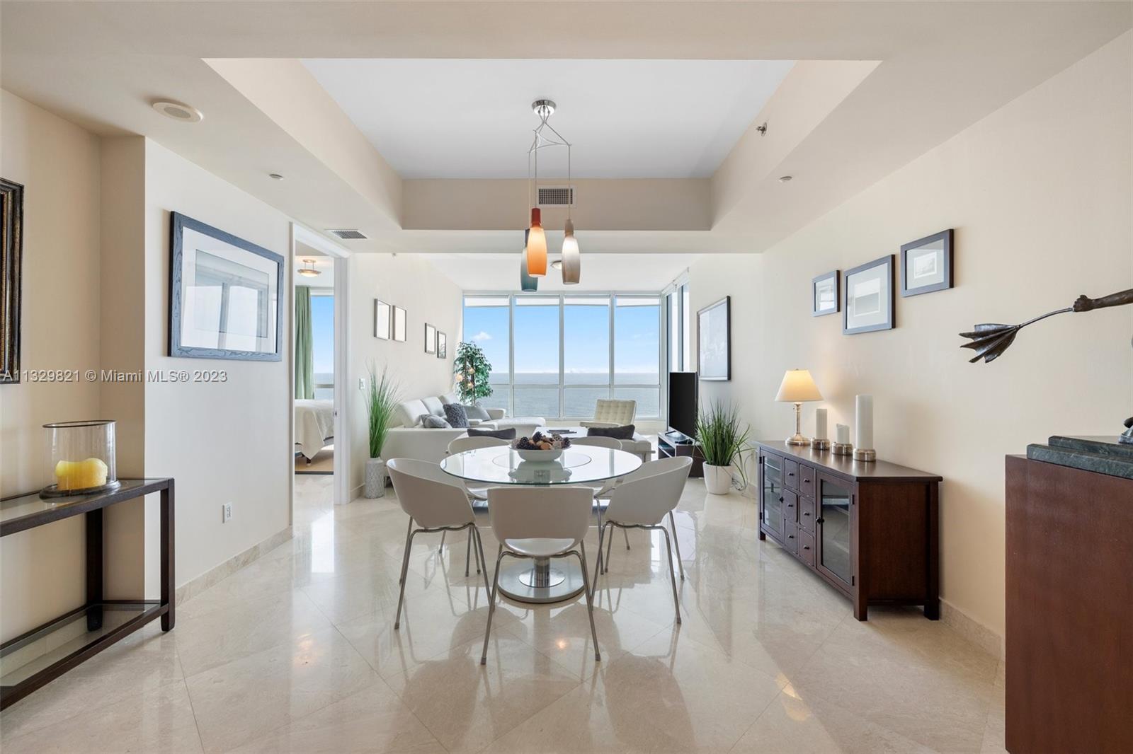 This gorgeous luxury apartment line located at the Continuum South Tower on the 15th floor is rarely available: 2 large bedrooms, 2.5 bathrooms. 

Stunning 180 degree ocean and beach view with access to 2 large balconies from the living room and bedroom. A private elevator brings you to your private foyer and entrance to the apartment. Amazing 10 foot ceilings. Magnificent shiny marble floors throughout. Fully equipped white gloss Italian kitchen with stainless steel appliances and dark marble countertops. Washer and dryer in the unit. The building offers luxury amenities including 24 hrs security and valet parking. State of the art 3 story fitness center and sporting club, 2 giant lagoon pools, lap pool and beach/pool services. Poolside restaurant pavilion and 3 tennis courts...