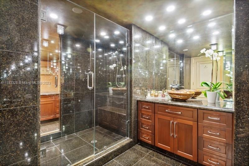 His & Her Master Bathroom Separated with Stand up Shower