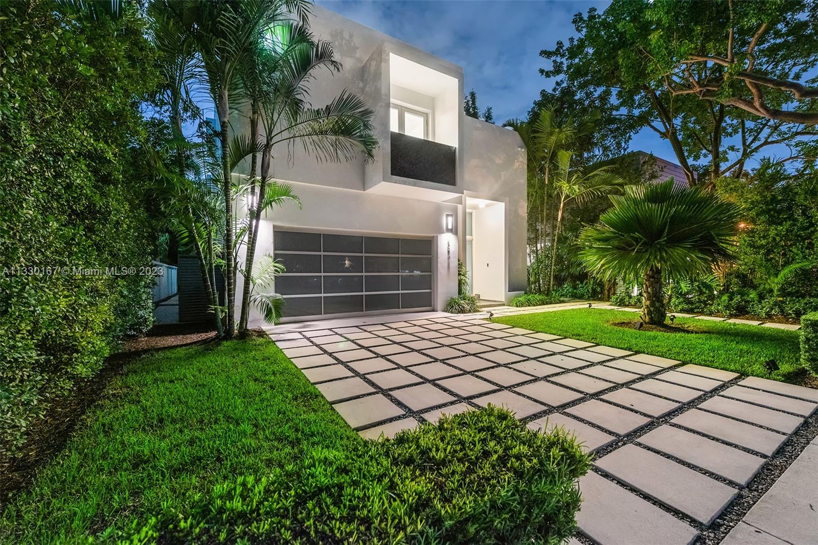 Miami charm meets modern lux - this five bedroom, 3 bathroom pool home is a rare gem! Nestled in the pedestrian friendly community of South Miami and neighboring the Coral Gables waterways that lead you right into the heart of Coconut Grove and Downtown. Step inside the foyer and you are instantly captivated by 20 foot ceilings graced by walls of windows in this one of a kind great room that gives open concept a new meaning. The canopy of bamboo provides the privacy you deserve and creates a unique backdrop as you look out of the oversized windows. Once you step on to the covered patio, an oasis awaits along with all the choices that make outdoor living in South Florida a fan favorite. Featuring a summer kitchen, outdoor dining, multiple poolside lounge areas and unique pool waterfall!