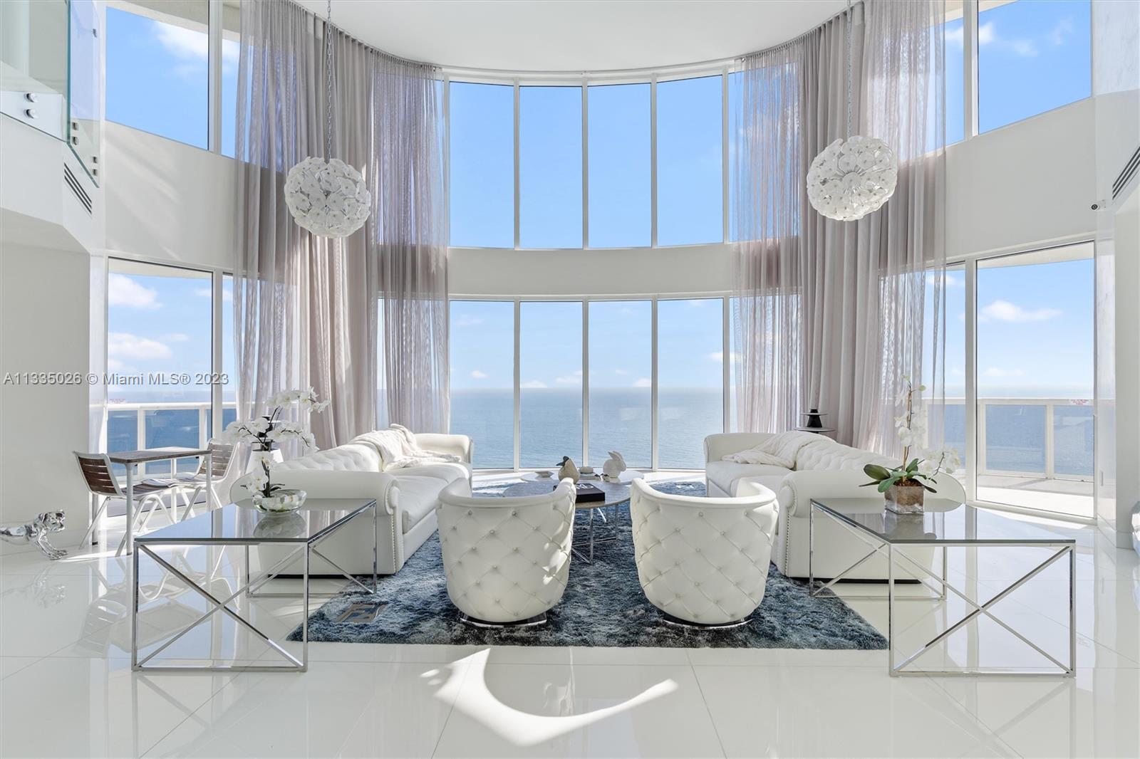 Luxurious, high-rise residence w/ stunning views of the ocean and city skyline. 2 levels, Open floorplan, spacious living areas and floor-to-ceiling windows that provide natural light and breathtaking views.Top-of-the-line finishes, including marble flooring, custom cabinetry, and high-end appliances. Gourmet kitchen designed for the home chef w/ a large island, stainless steel appliances, and ample counter space. Living room opens up to a large balcony, providing the perfect space.Master features a spa-like bath with a large soaking tub, dual vanities and a separate shower. Bedrooms are spacious and well-appointed, offering plenty of closet space and views of the ocean and city.Residents have access to a wide range of luxurious amenities. 2 storages - Prime location.Exceptional PH in MB