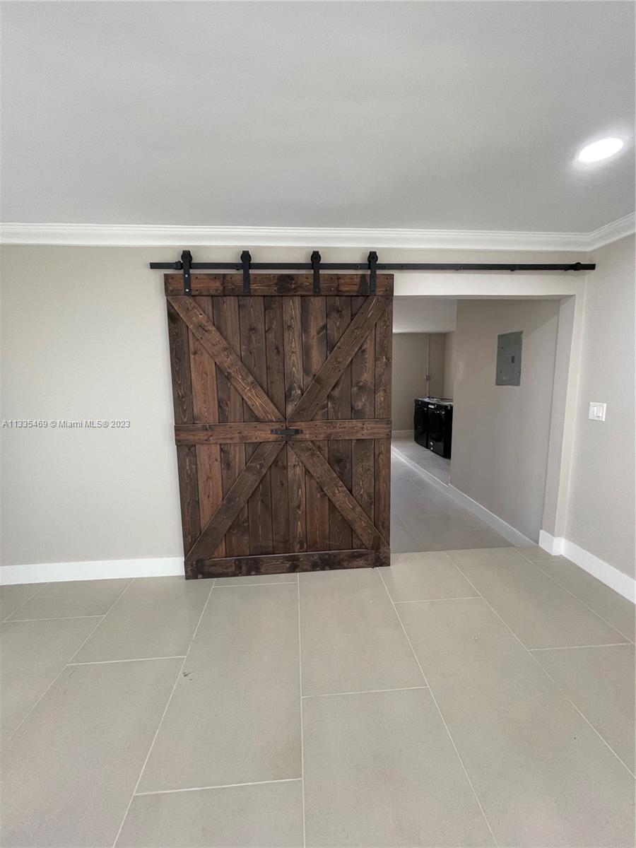 Door to Garage/Gameroom/Office area