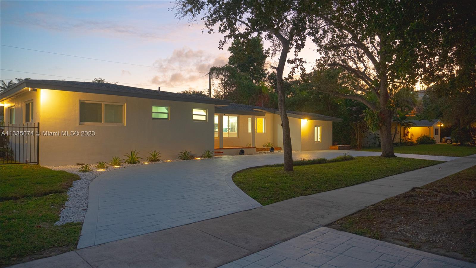 Step into luxury in this fully remodeled 3/2 North Pinecrest pool home. Located on a quiet dead-end street, this gem boasts new appliances, impact windows, and a custom-built pool. The open-concept kitchen and updated bathrooms add a modern touch, while hardwood floors bring warmth. An added bonus room offers versatility as a man's cave, playroom, or extra family room. Lawn and pool maintenance are included in rent. Don't miss this rare find!