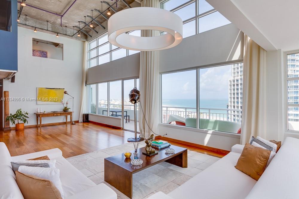 Beautiful Penthouse in the desirable South of Fifth with 270 degree views. A real loft facing the ocean with African Teak Wood floors, 4 bedrooms, 3.5 bathrooms, tv room, dining room, plenty of closet spaces. Two stories with a balcony in 3 of the bedrooms, high impact windows/ doors, the kitchen is by Mia Cuccina and bar with a wine cooler.