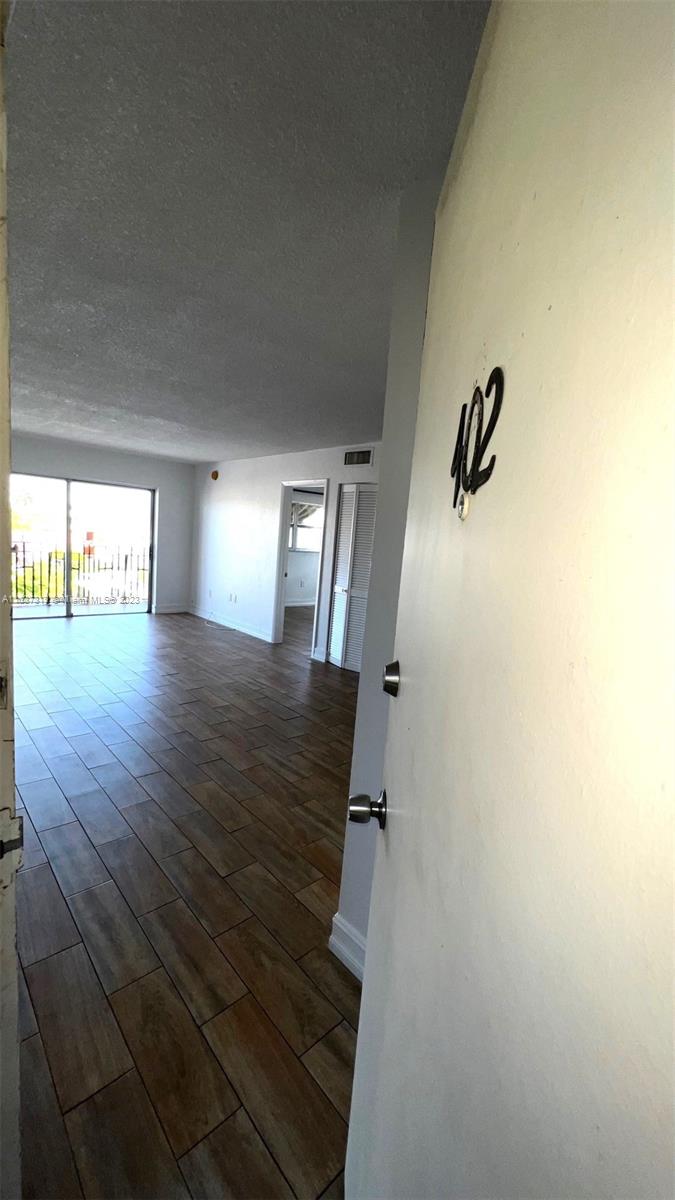 Centrally located 1/1 freshly painted and ready to move in as soon as you are approved by association. Tile Floors throughout. Association  approval is max 15 business days. $300 Pet Non-Refundable deposit.