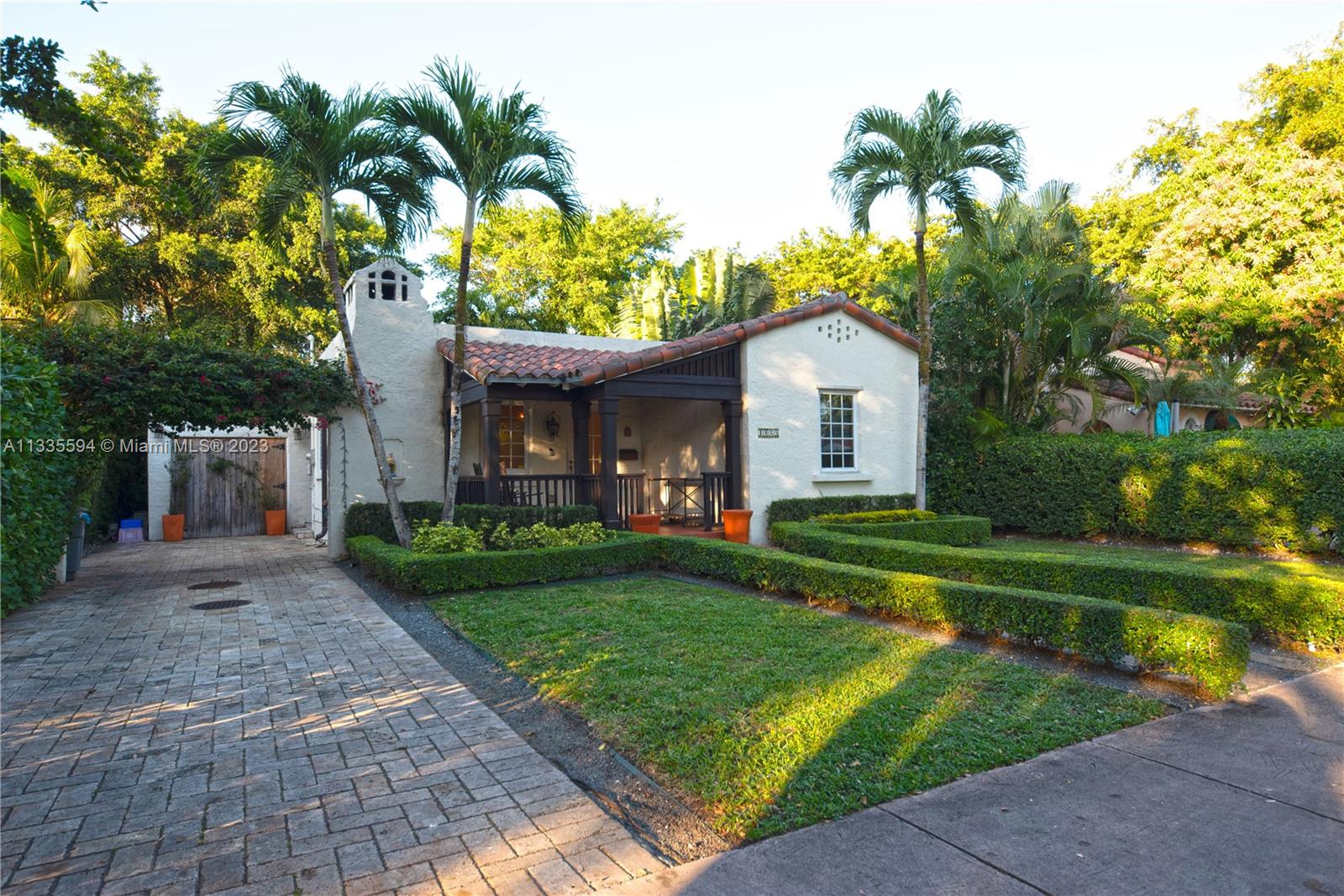 Charming 1920's home in the heart of Coral Gables awaits you! This beautiful residence is comprised of a total of 4-bedrooms & 3-baths distributed between a 3/2 in the main house and a separate 1/1 in-law's quarters. With cozy front porch, original wood floors, fireplace, & covered patio this home is sure to enchant you. And with impact windows throughout, you will have the security that you need. Located walking distance to Venetia & Majorca Parks, Granada Golf Course, Publix & Sedano's supermarkets, Roma Bakery & more! We look forward to giving you the tour!