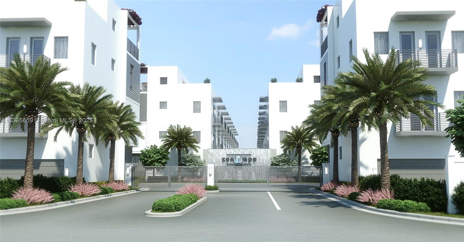 Spectacular and luxurious Townhouse, with prime location, porcelain and wood floors. Luxury and contemporary details. Terrace with yacuzzi, with IVY roof and lights. Two cars roofed garage, and two additional spaces, one in front of the garage and one in the community. Entrance in front of the new Doral Water Park currently under construction.