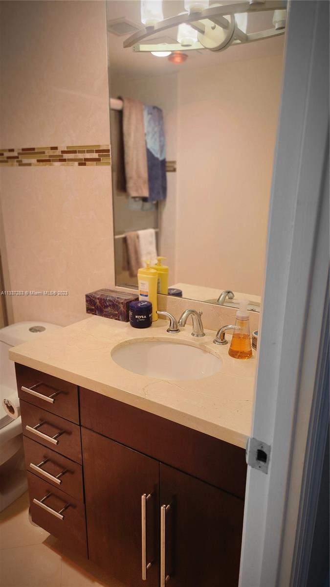 stall shower and very roomy bathroom