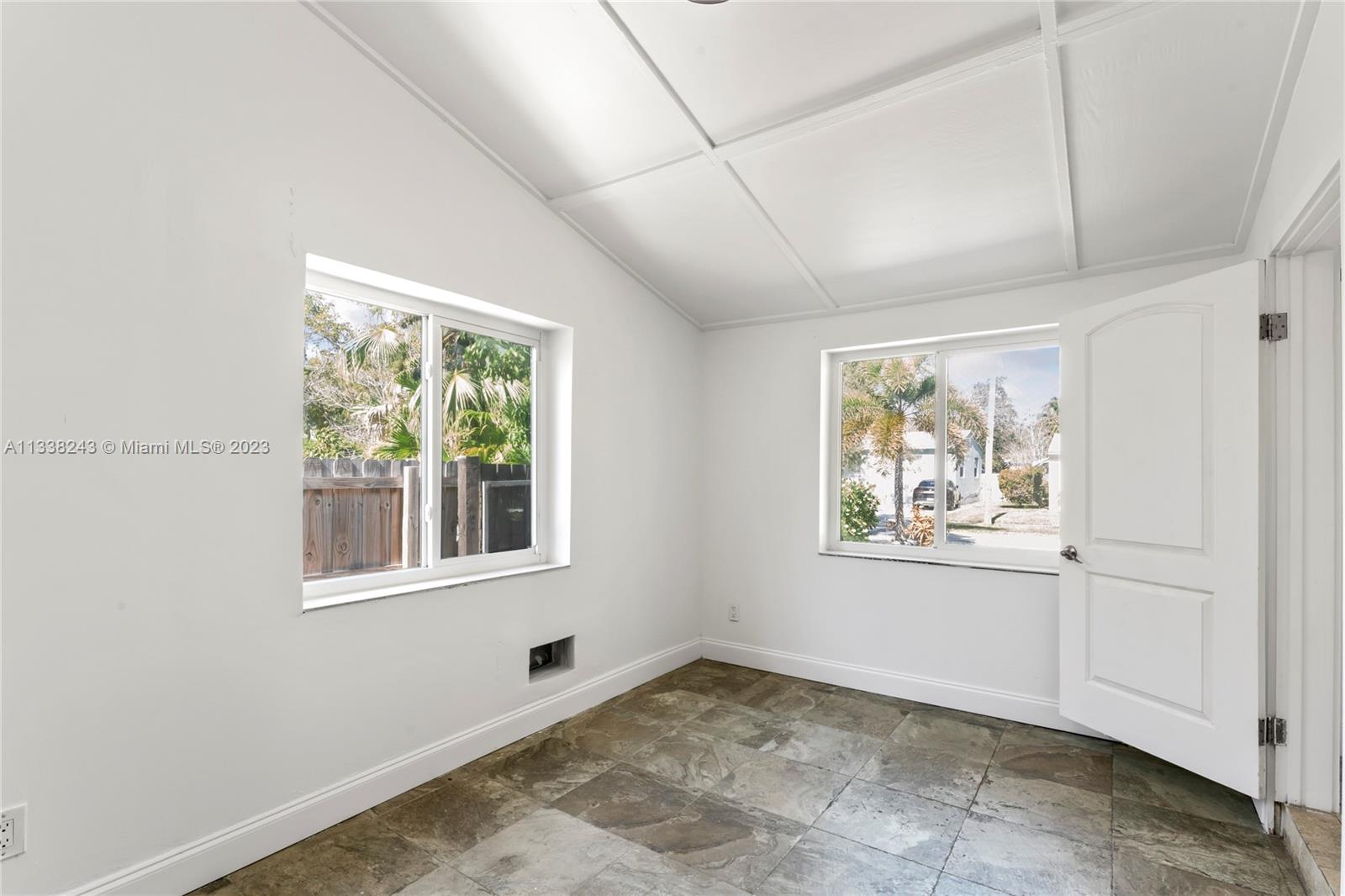 Bonus sun room/ utility room. Enclosed carport