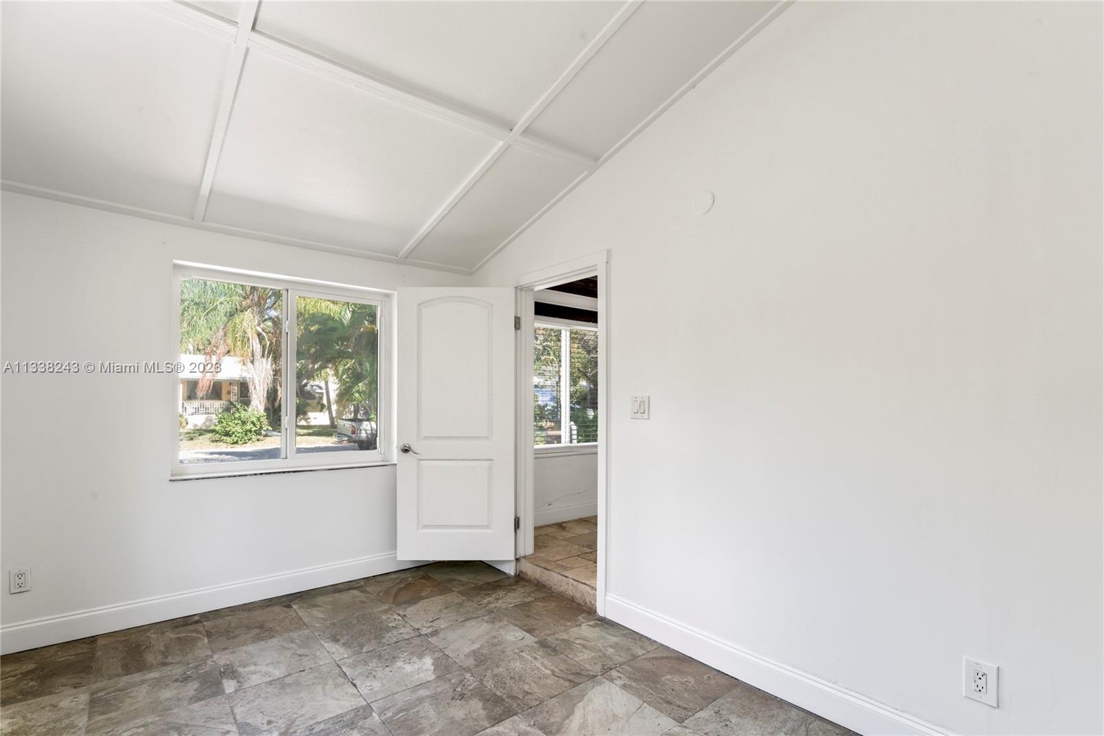 Bonus sun room/ utility room. Enclosed carport