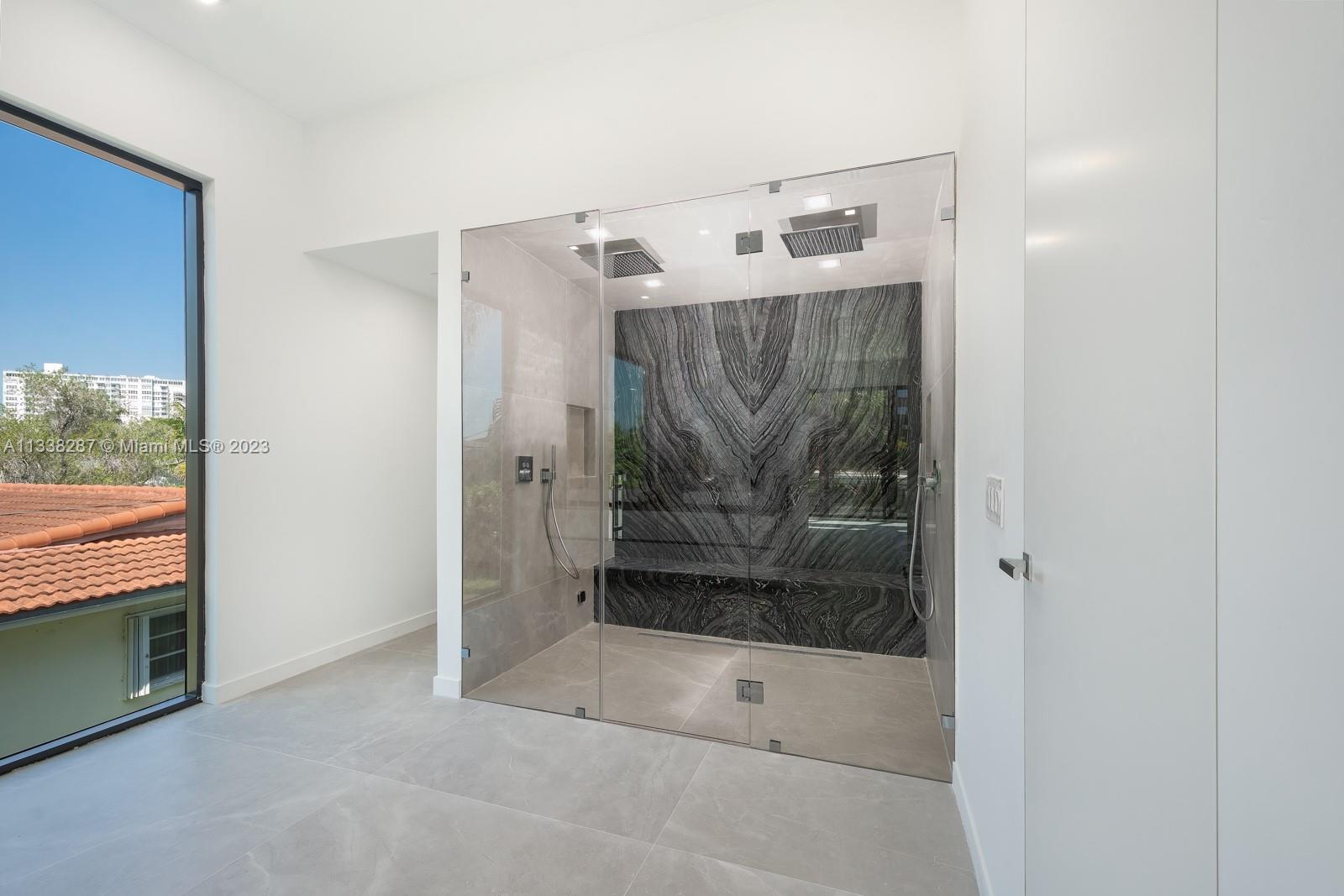 Upstairs Primary bathroom w steam shower