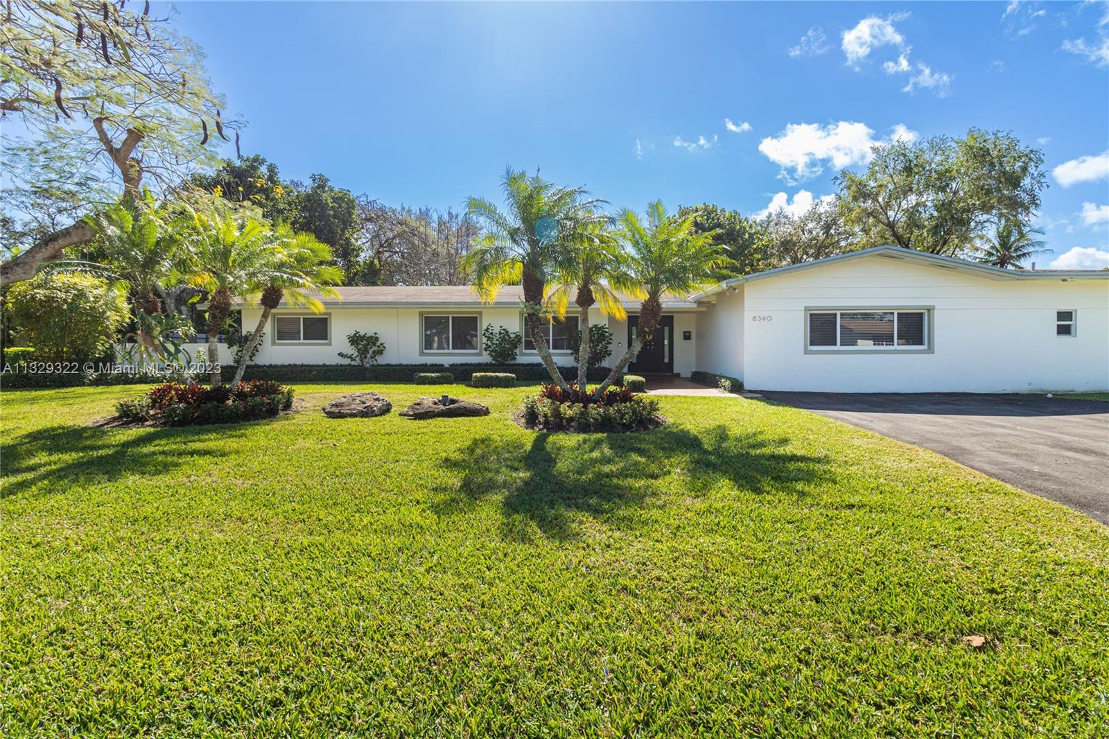 This home was renovated home in 2015 with permits. 2012 shingle roof, plumbing was updated to PVC, marble floors throughout, PGT impact glass windows & doors throughout, quartz stone tops, pearl stone backsplash large kitchen with real maple wood cabinetry all bathrooms include Madeli vanities w/quartz. Oversized family room area great for entertaining! Modern swimming pool with led lights and sheer waterfall wall including bubbler, dura fence, cabana bath and many more extras. Walk to the park, some of the best schools in the district. Also has a large metal shed. Mature tree's, bamboo, avocado, sugar apple & large royal Poinciana tree. To many upgrades to list, this is a must see!
