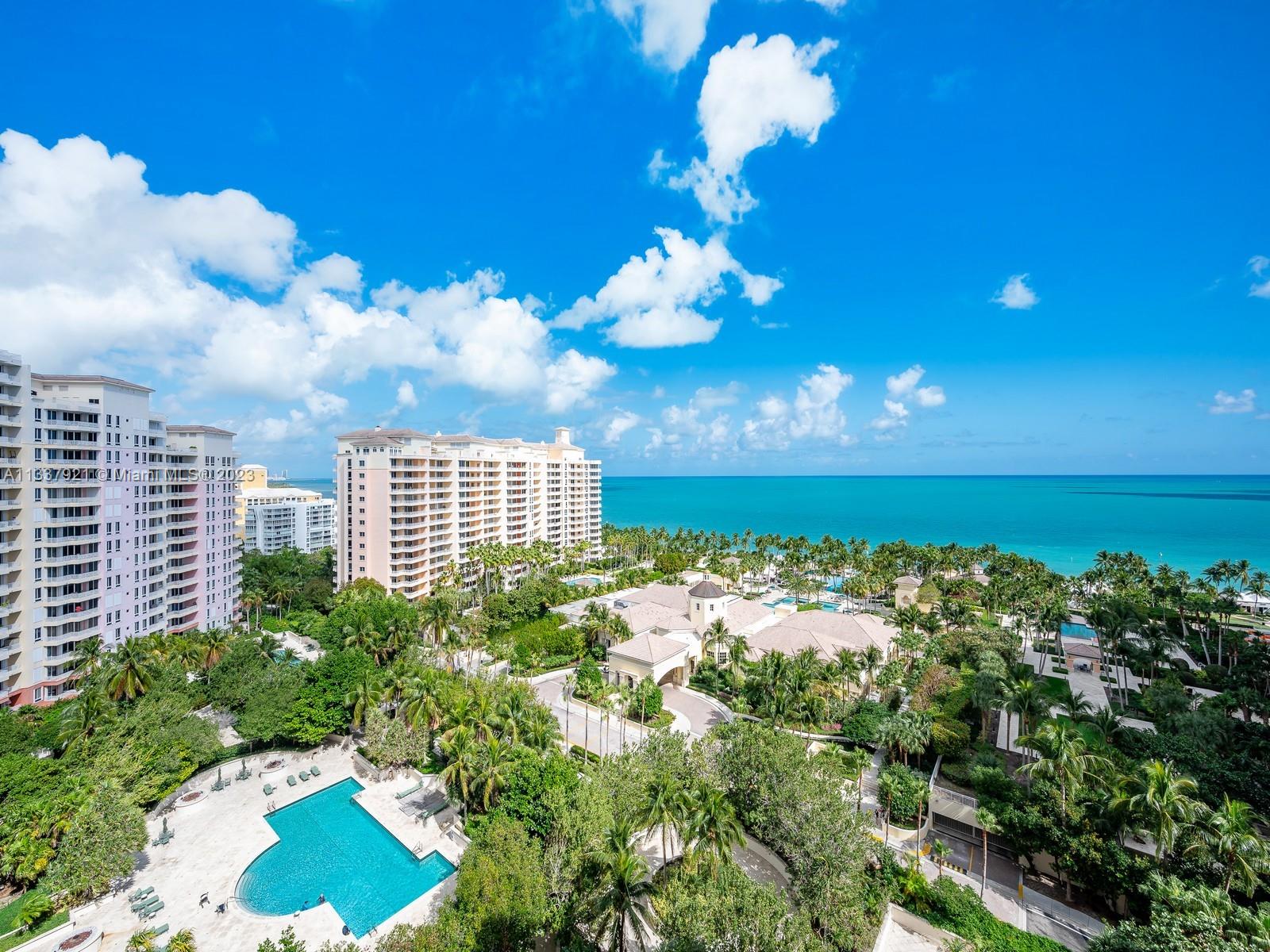 The very best of Key Biscayne and a rare opportunity! Very few of these spacious 4,200 SF two level homes were built at the Ocean Club. The residence offers the comfort of a large home combined with luxury beachfront resort amenities. Throughout the open floorplan, enjoy spectacular views of beautiful sunrises over the ocean and unobstructed sunsets that illuminate the island,
Bill Baggs State Park and the Biscayne Bay. A private elevator opens to a spacious and bright first floor that is ideal for entertaining with two separate living areas, formal dining, elegant bar, powder room, oversized eat in kitchen and a bedroom suite. The second floor offers three suites (a fifth bedroom is possible), family room and conveniently located laundry.