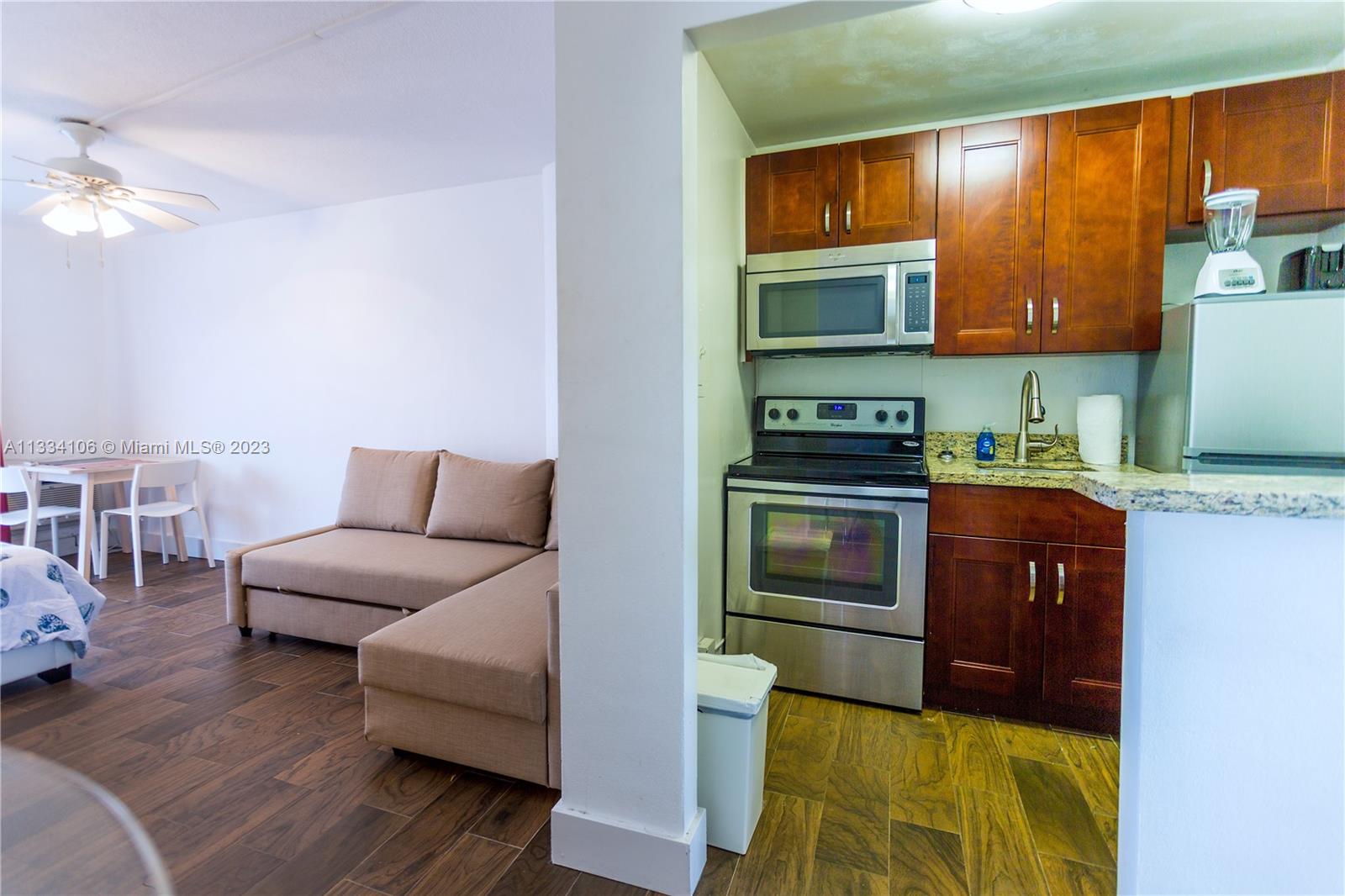 Living room & well  equipped kitchen