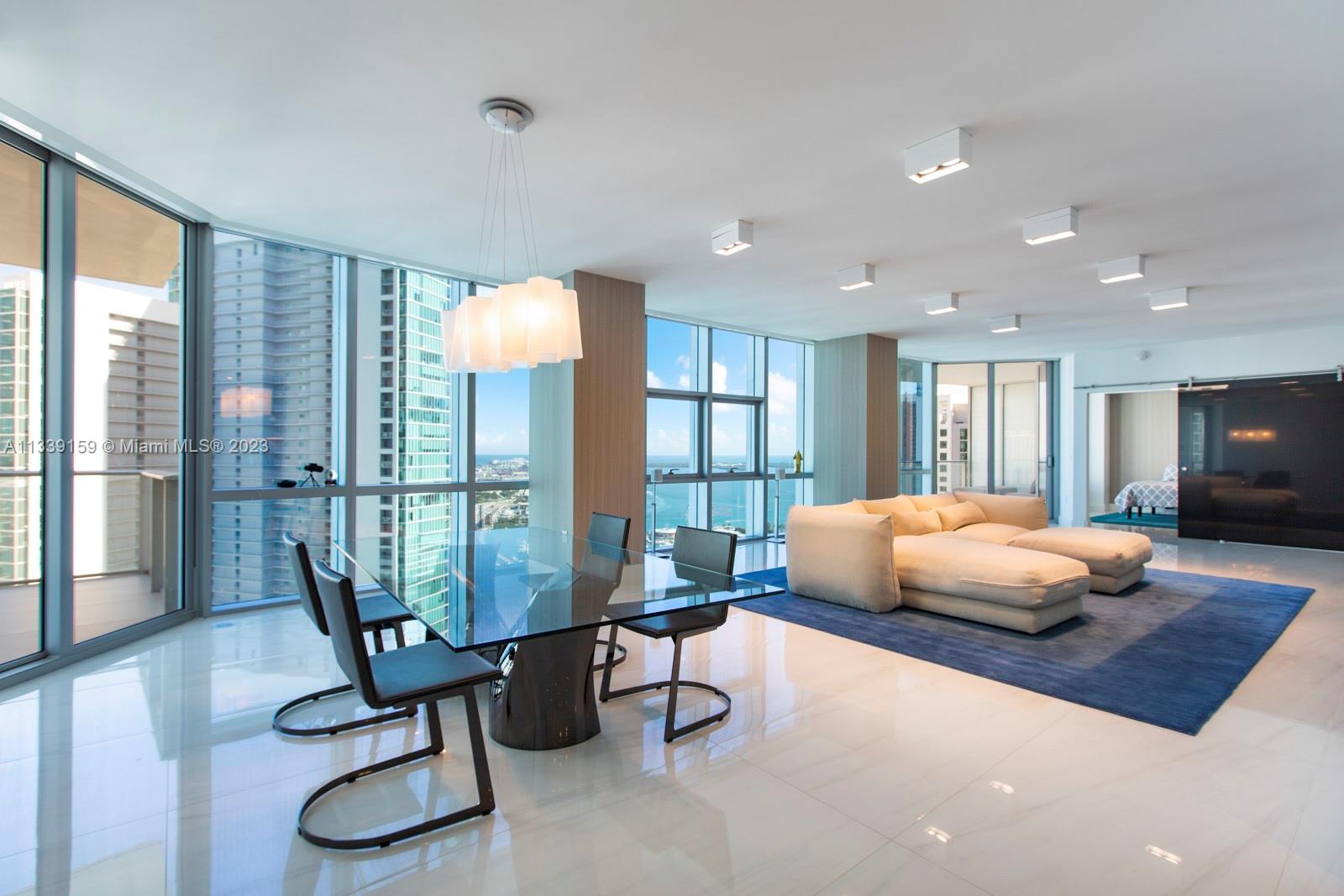 Available for one year lease. A custom residence with over 3,000 SF of interior space at Paramount Miami WorldCenter. This combined residence offers large entertaining space, lots of natural light, two primary bedrooms with ensuite bathrooms and two balconies. Third room is currently open and used as an office. Designed by Steven G with redesigned kitchen, Poliform closets, motorized shades, large Italian porcelain floors, contemporary lighting, custom built-ins and bar. Two self-parking spaces included. Building offers an amenity rich environment including multiple pools, gyms, spa, jam room, media room, soccer and more. Conveniently located next to museums, park, arena and Brightline station and restaurants.