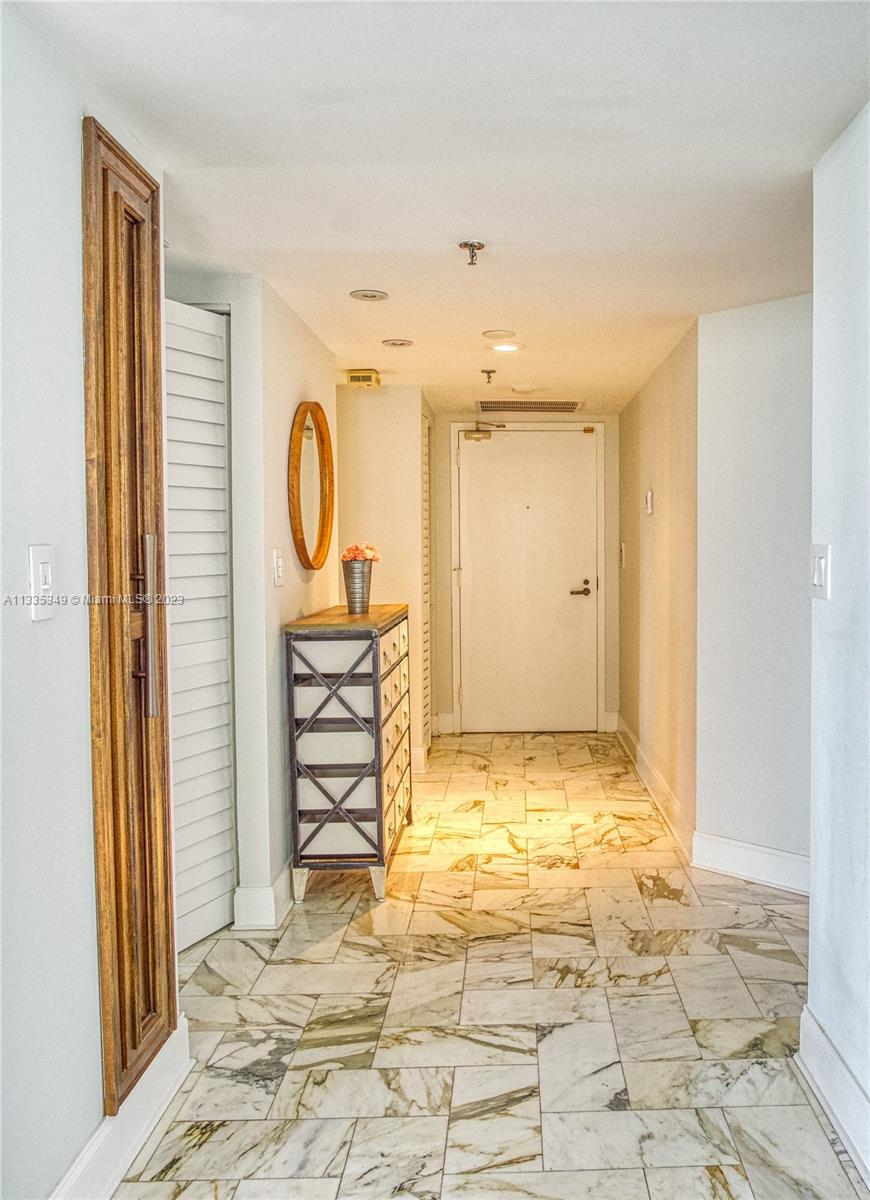 Live in the exclusive Island of Brickell Key with an amazing DIRECT BAY views to the East and garden views to the South from this Huge SW corner super bright unit featuring remodeled bathrooms, large wrap-around balcony, cozy open kitchen with Bkfst. area, wood cabinets & granite tops. Wood & marble floors throughout (no carpet!), lots of closet space (custom built) and a Large living / dining areas ideal for entertaining. Bldg. features amazing manicured garden mezzanine, large bay-front pool, jacuzzi, tennis, gym & much more.. Tenant occupied but can break lease one month noticed.