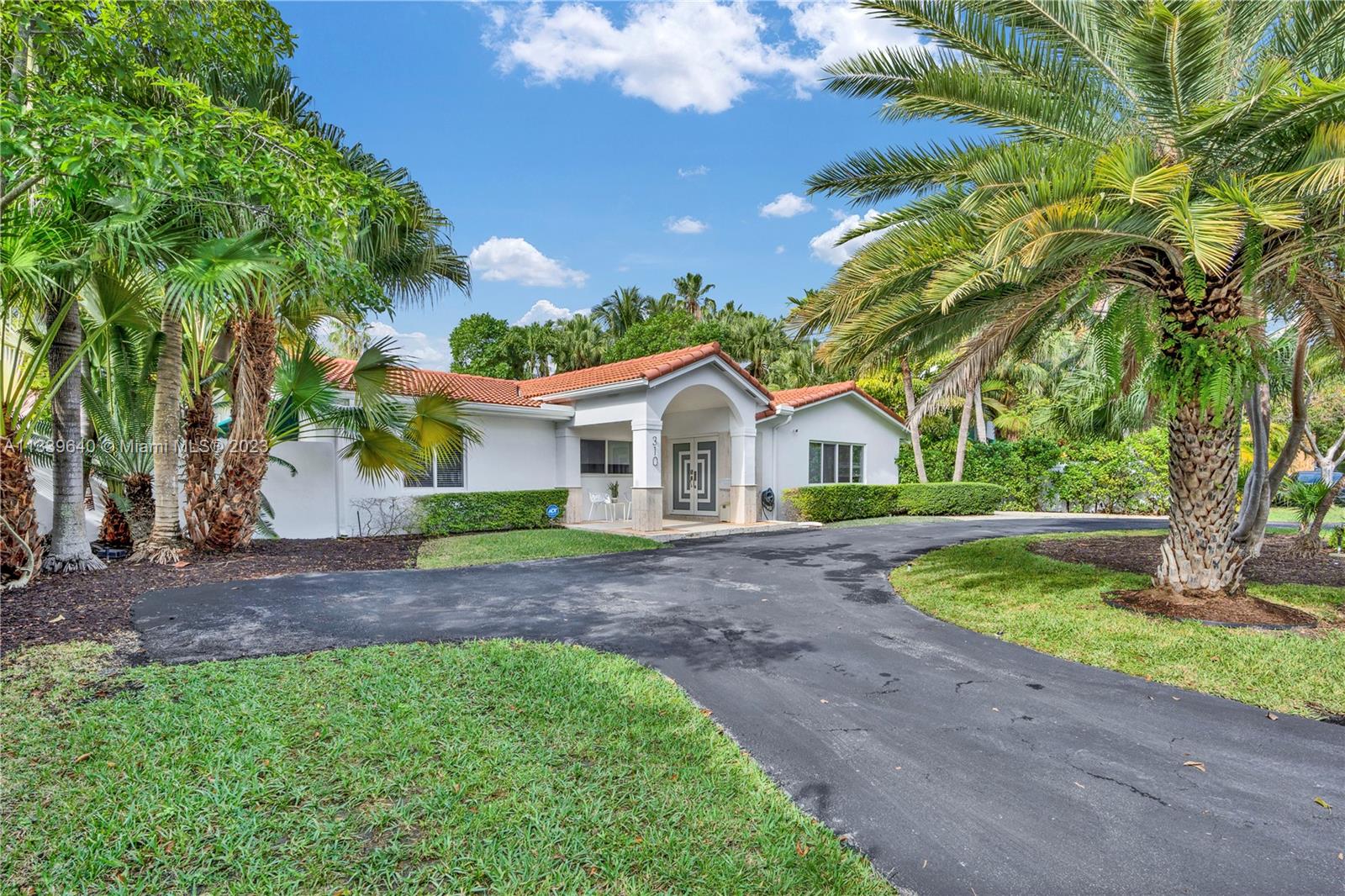 Beautiful curb appeal and oversize lot in one of the premier location on the exclusive island of Key Biscayne