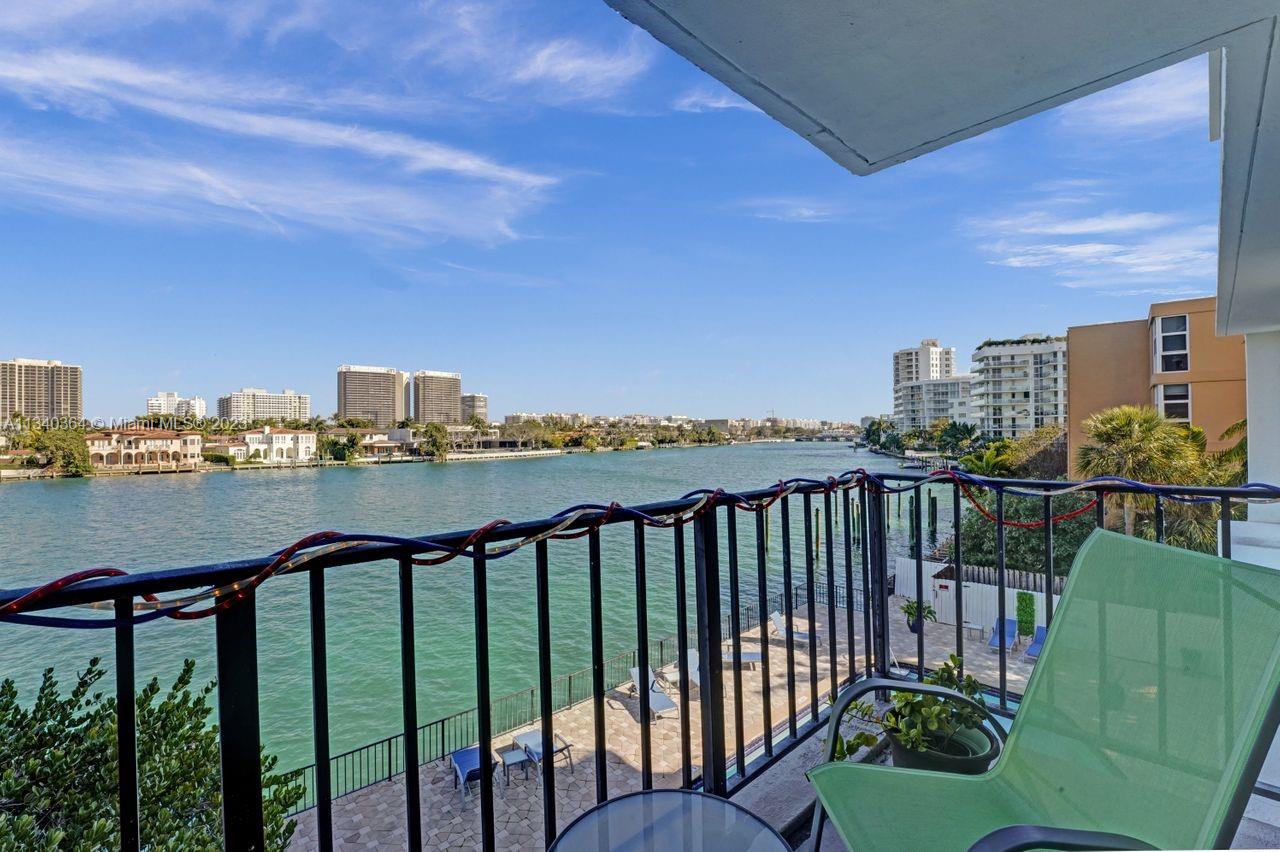 NEW PRICE! TWO PARKING SPACES with this residence, with a fantastic direct intracoastal water view, 2 Bedrooms, 2 Bathrooms 1,300sf condo, with large balcony facing the Intracoastal Waterways and Bal Harbour skyline. Live and enjoy this very safe Island, boutique building with front desk, lobby, pool, paddle board access and close to excellent schools, shops, restaurants and more! Enjoy the lifestyle and your gorgeous water views! 2 parking spaces. Monthly maintenance includes electricity, internet, cable tv, water and all common areas. Some updating includes SMOOTH ceiling throughout the unit, semi new appliances and kitchen cabinets, etc.