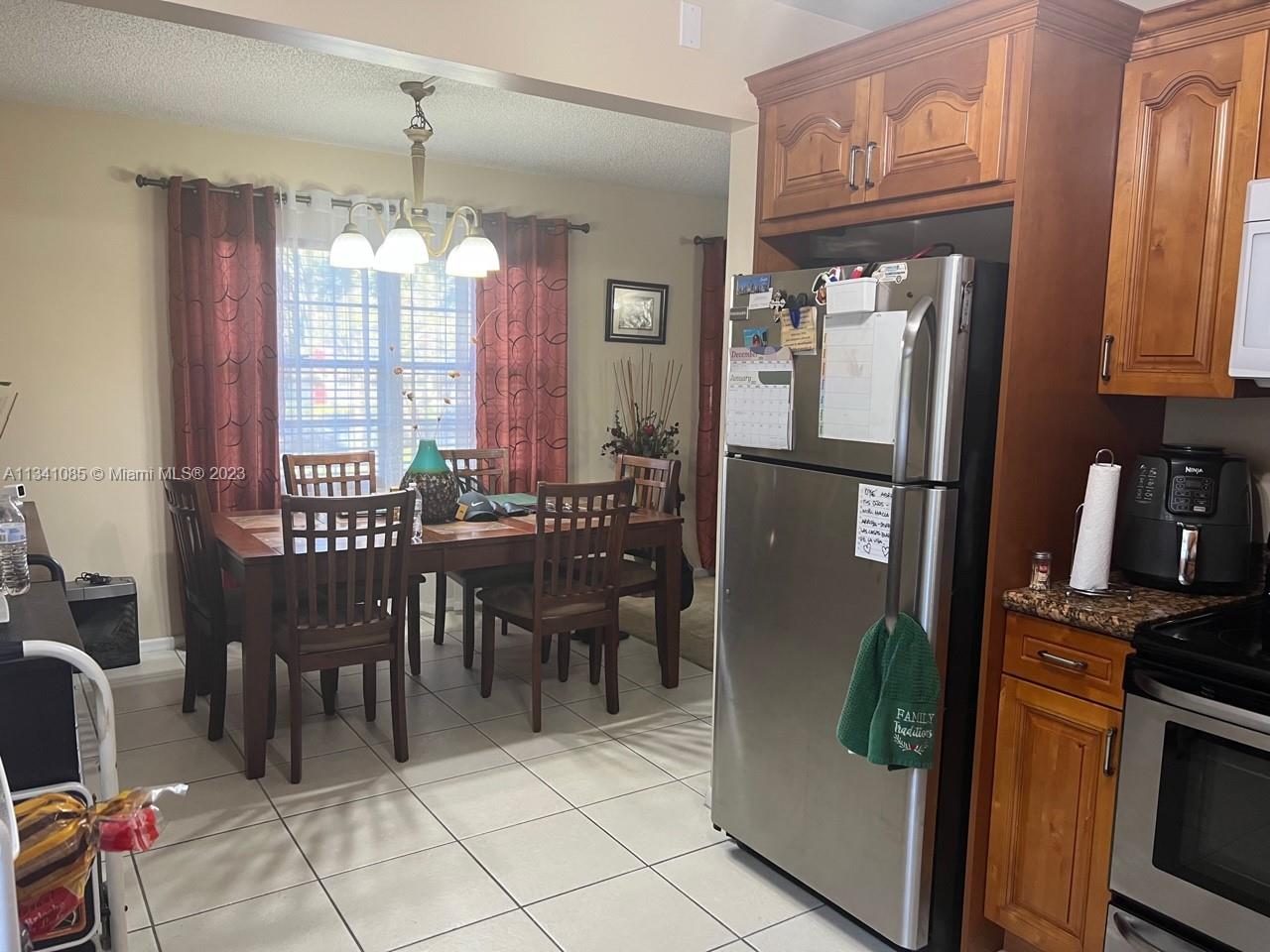 Tile floor in the kitchen/dinning