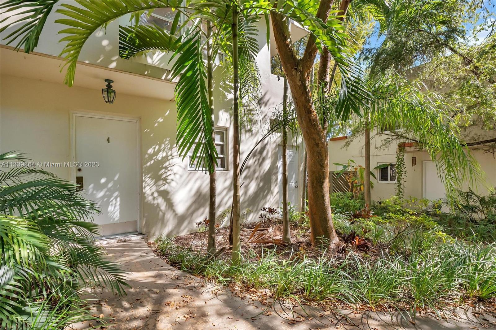 Awesome Center Coconut Grove townhouse walking distance to Cocowalk, the dog park, Marina's and so much more to really take advantage of this amazing location.  Gated parking for one car plus additional guest parking.  Nice corner unit offering great light, open kitchen and two bedrooms upstairs.  Washer/Dryer in the unit.  Easy to show.