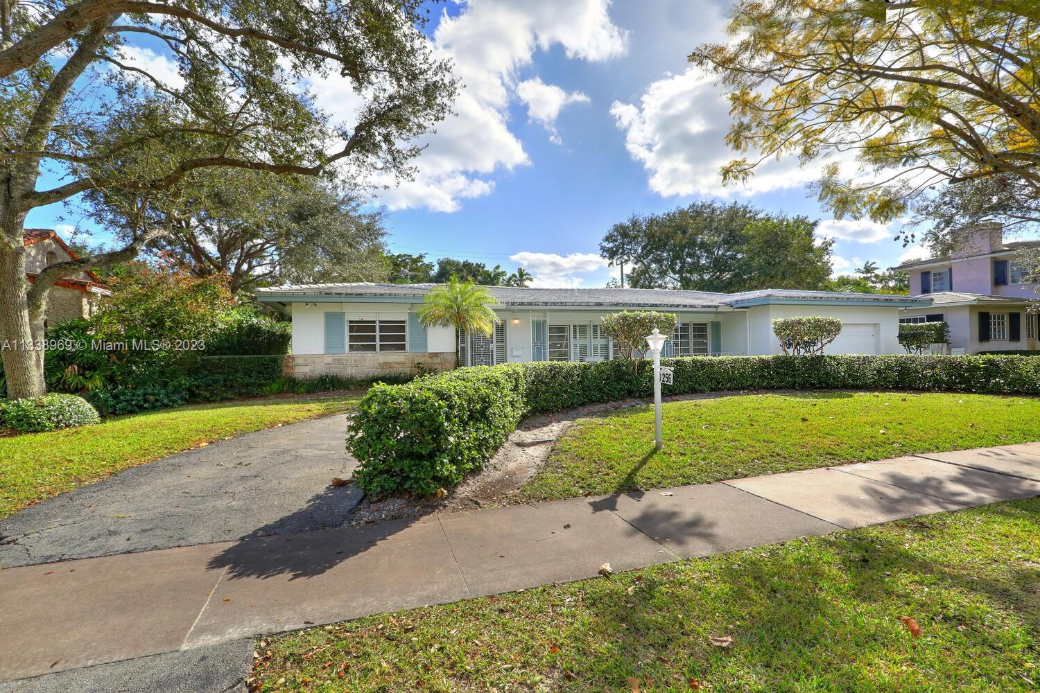 Miami's desired Coral Gables location. Overlooking the Granada Golf Course on prestigious South Greenway Drive. Combine to have a 25,000 lot size. This is a special opportunity to live in a very desirable location in a beautiful & unique part of Coral Gables. This home has been well cared for and is located adjacent to another special offering, 1260 S. Greenway. Home for sale which also sits on a large 12,500 square foot lot. This is a very grand house with a beautiful and large outdoor screened patio area. Room for a pool. Large living area as you enter, 2 bedrooms on the East, 1 bedroom and bath on the right. This home needs updating throughout. Complete with central air & a two car garage. Make it even more special!