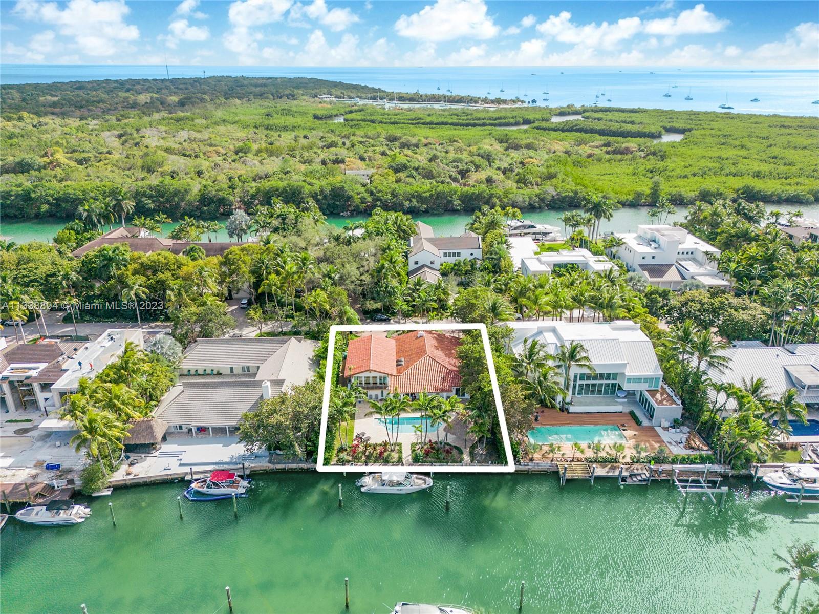 Key Biscayne ocean access waterfront home with no bridges to Bay. 88 feet on the water.  Accommodates large yachts (turning basin).  This lovingly maintained home on a no-traffic street is in excellent condition.  This property is an excellent value surrounded by homes in the $15-$20 million plus range. Excellent home for entertaining with pool, generous patio area and gazebo by the water!  Ultra secure location at the end of Key Biscayne next to Bill Baggs Cape Florida State Park. Take your boat around the corner for lunch or dinner and drinks at Boater's Grill and The Cleat.  Update and add value, build a modern masterpiece or move right in to this beautifully maintained ocean access home!