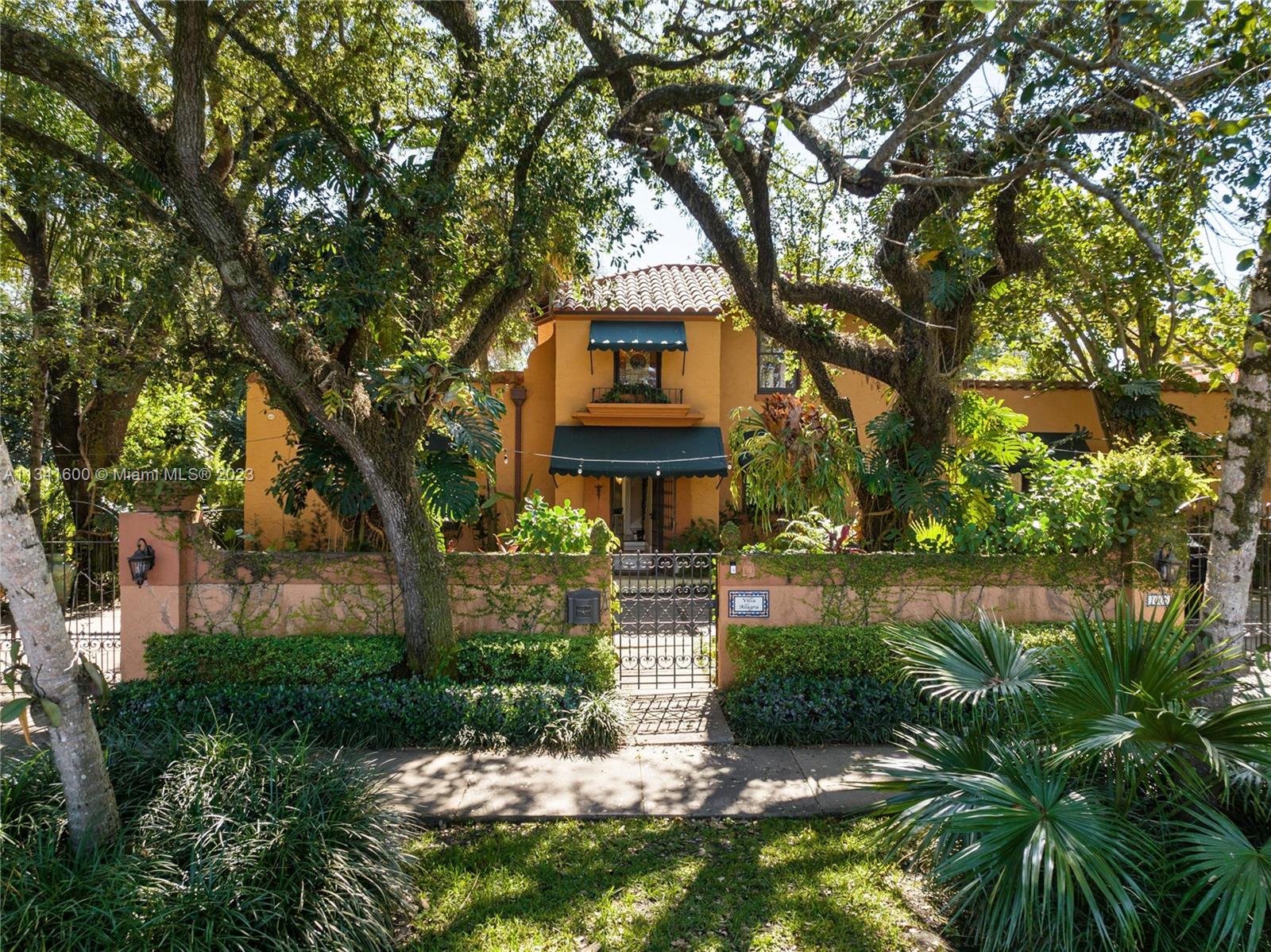 Sitting across from the Granada Golf Course, "Villa Allegra" combines the charm of a bygone era with today's comforts. Designed by noted Miami architect Walter De Garmo, this landmark received the City Beautiful Award. Set on a park-like, corner lot of 22,500 SF, this walled and gated home features a grand entrance, formal living room, architectural fireplace, formal dining room, primary kitchen, family room, and 2 courtyards. In addition, there is a morning kitchen and full living service quarter. All impact windows. Owners converted the 2nd floor into a principal suite, with a large sitting area, office, coffee station, a spacious dressing room, and his and hers full bathrooms. So many fruit trees you will never have to purchase again. This home is a true Coral Gables treasure.