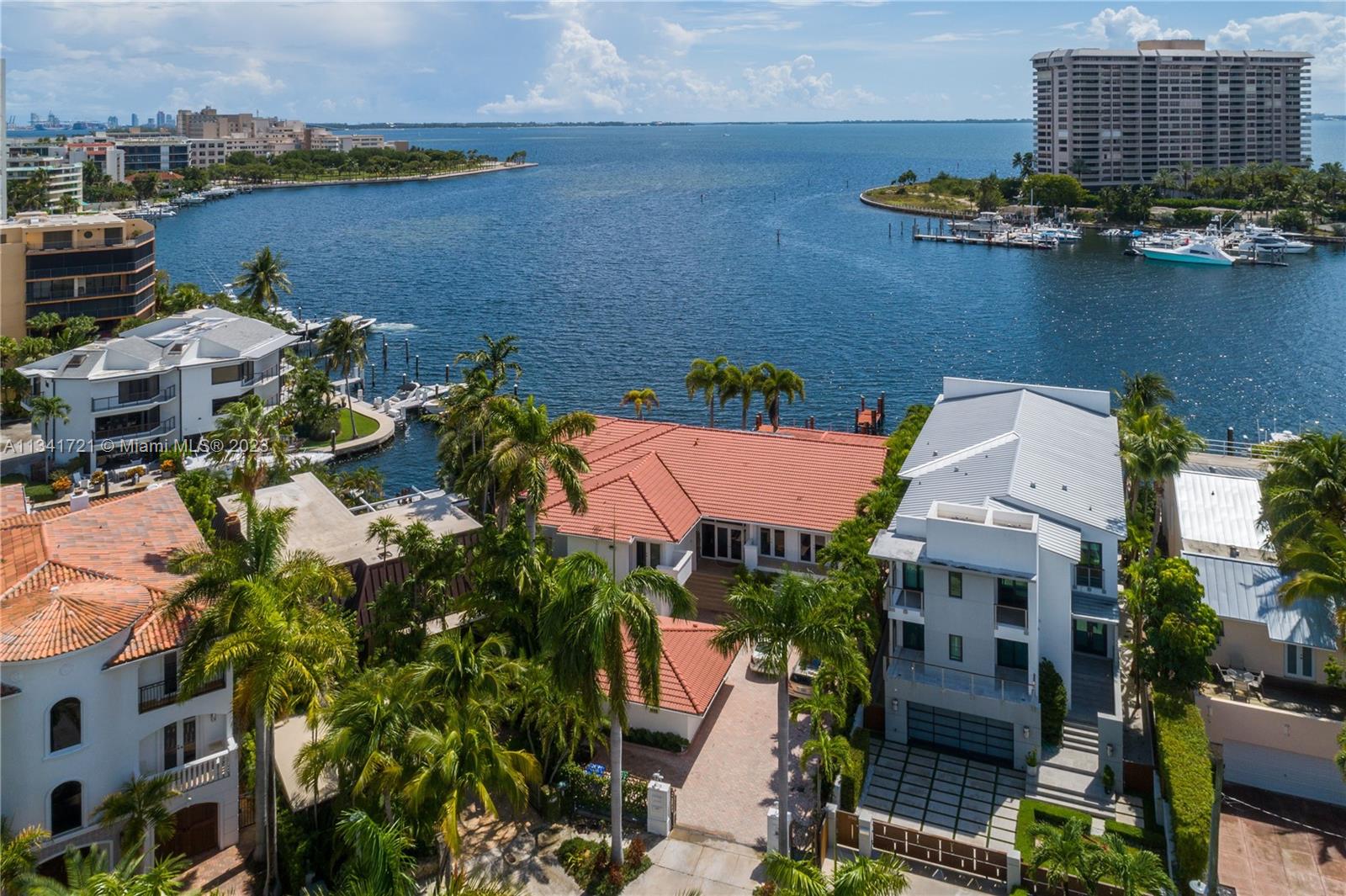 INCREDIBLE OPPORTUNITY TO BUILD YOUR DREAM HOME ON BISCAYNE BAY! BOATER'S PARADISE WITH 150 FEET OF WATERFRONT. WIDE BAY IN THE HEART OF COCONUT GROVE. CORNER LOT WITH DEEP 12'  WATER AND A DEEP WATER CHANNEL. DIRECT OCEAN ACCESS, TWO DOCKS,  DAVITS, TO ACCOMODATE YACHTS, TENDER BOATS, JET SKIS AND MORE. MOMENTS TO THE BEST YACHT CLUBS, MARINAS, MILES OF WATERFRONT PARKS, WORLD CLASS DINING, SHOPPING AND SOME OF THE BEST SCHOOLS IN THE COUNTY.