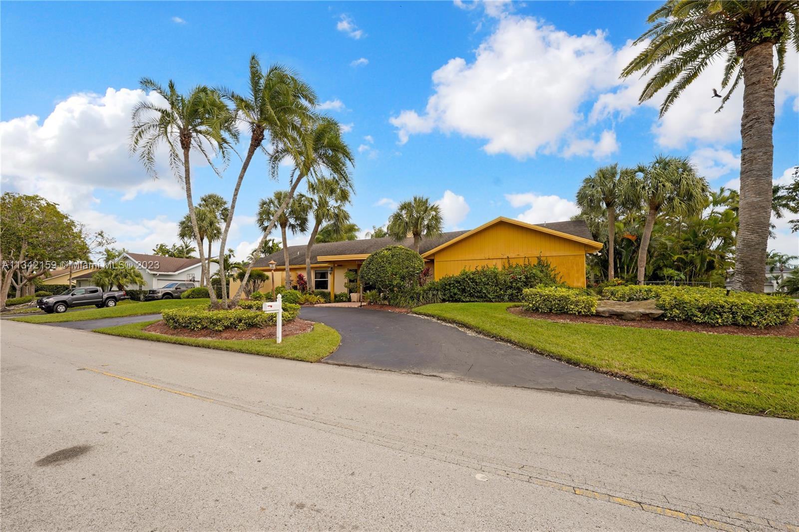 A real Gem in Palmetto Bay! Gorgeous 4 bedrooms with wooden floors, marble floors throughout the home. 3 baths on a corner lot home 15,000 Sf full of spectacular exotic vegetation with swimming pool. Enjoy the open floor-plan with soaring vaulted ceilings with recessed lights throughout home. The heart of a home, the kitchen is voluminous with large gallery pantry, dual wall ovens with Viking appliances. Split bedroom plan grand primary suite with plenty of space for sitting area, large walk-in closet, bathroom with corner soaking bathtub natural light and lanai. Impact windows indoor large laundry room, w/plenty of storage space. Great outdoor entertainment areas. Circular driveway + 2 car garage. Excellent A schools, shopping, restaurants. The Seller requires a 60 day post-occupancy.